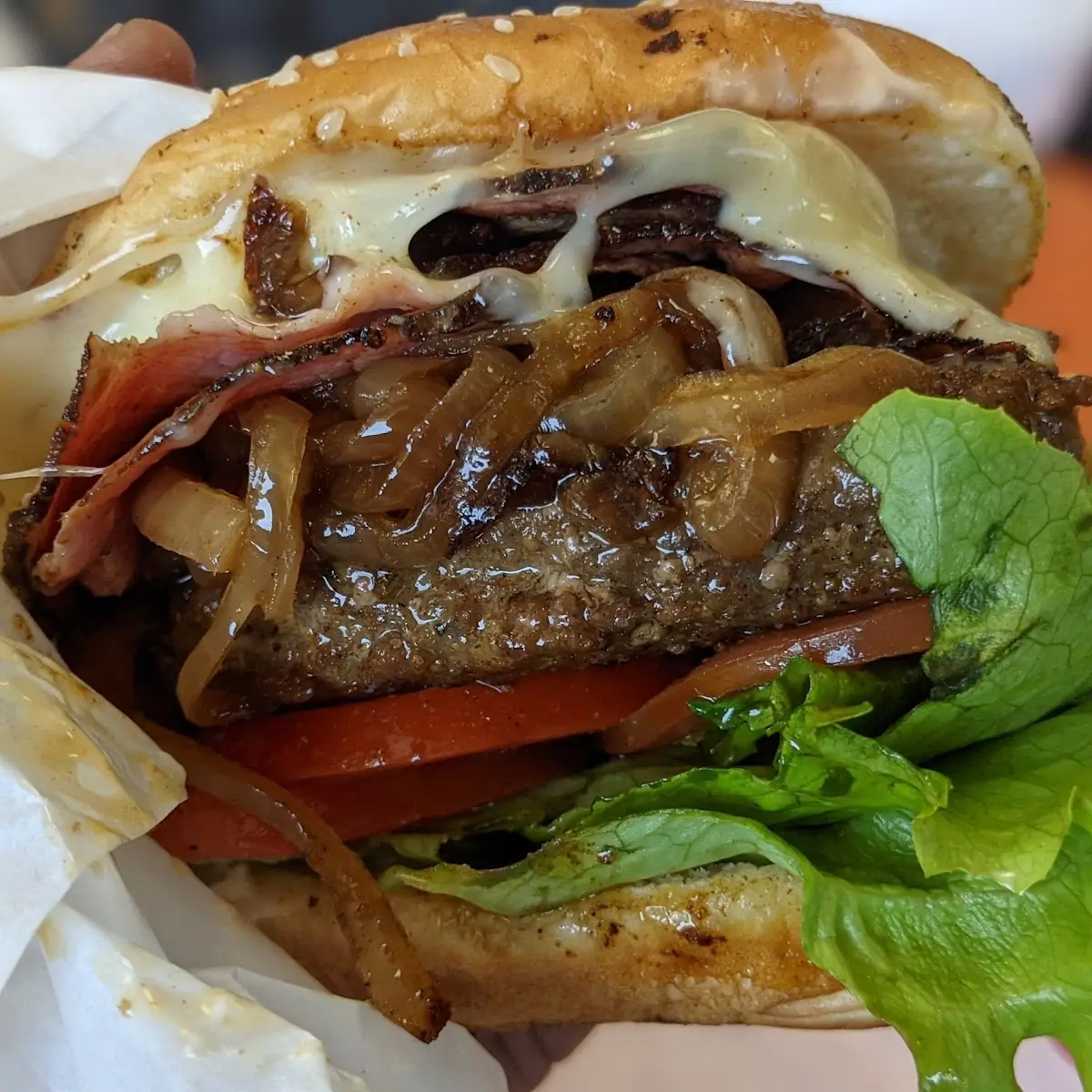 Pastrami Cheeseburger with Grilled Onions