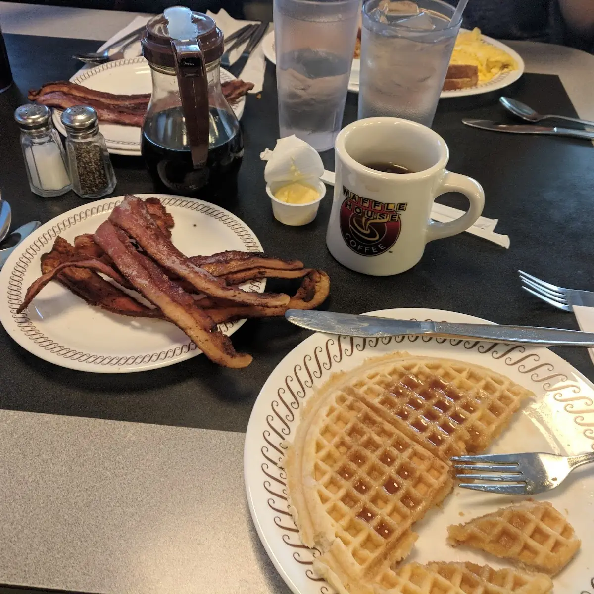 Waffle with Hash Browns Scrambled Eggs and Toast and Bacon