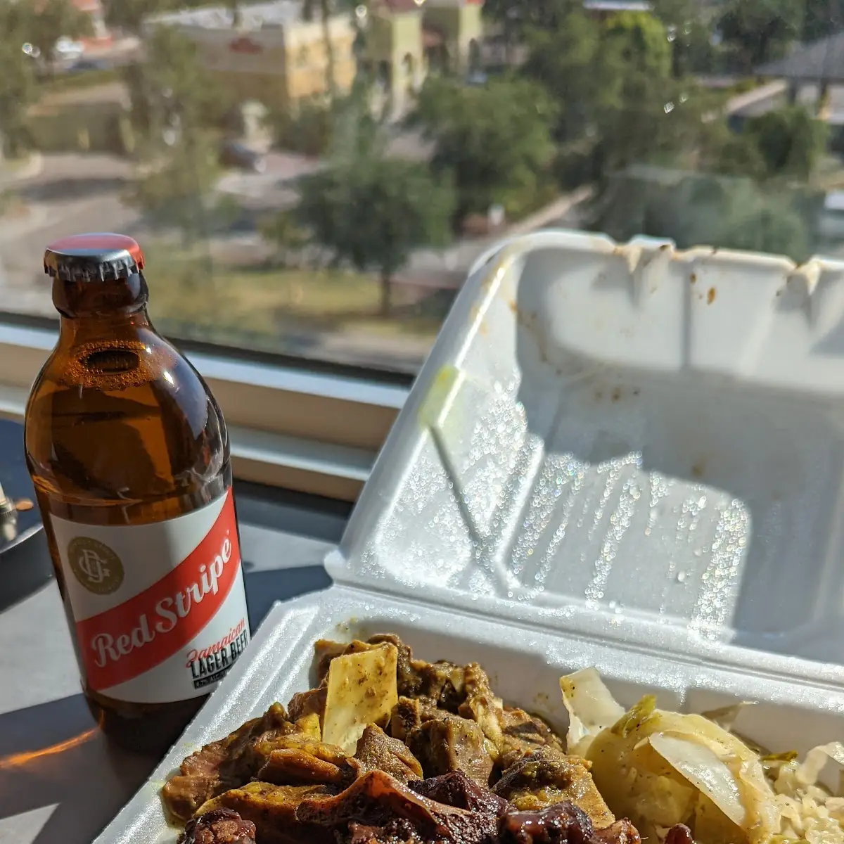 Oxtails and Curry Goat with Red Stripe Beer