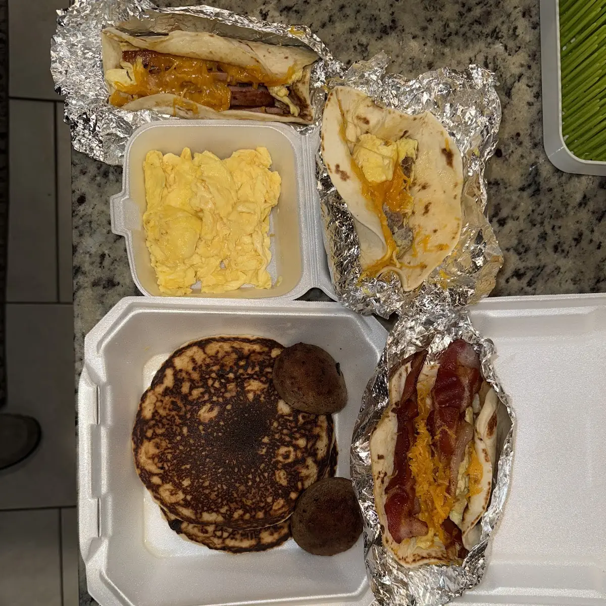 Pancakes with Sausage and Eggs and Bacon