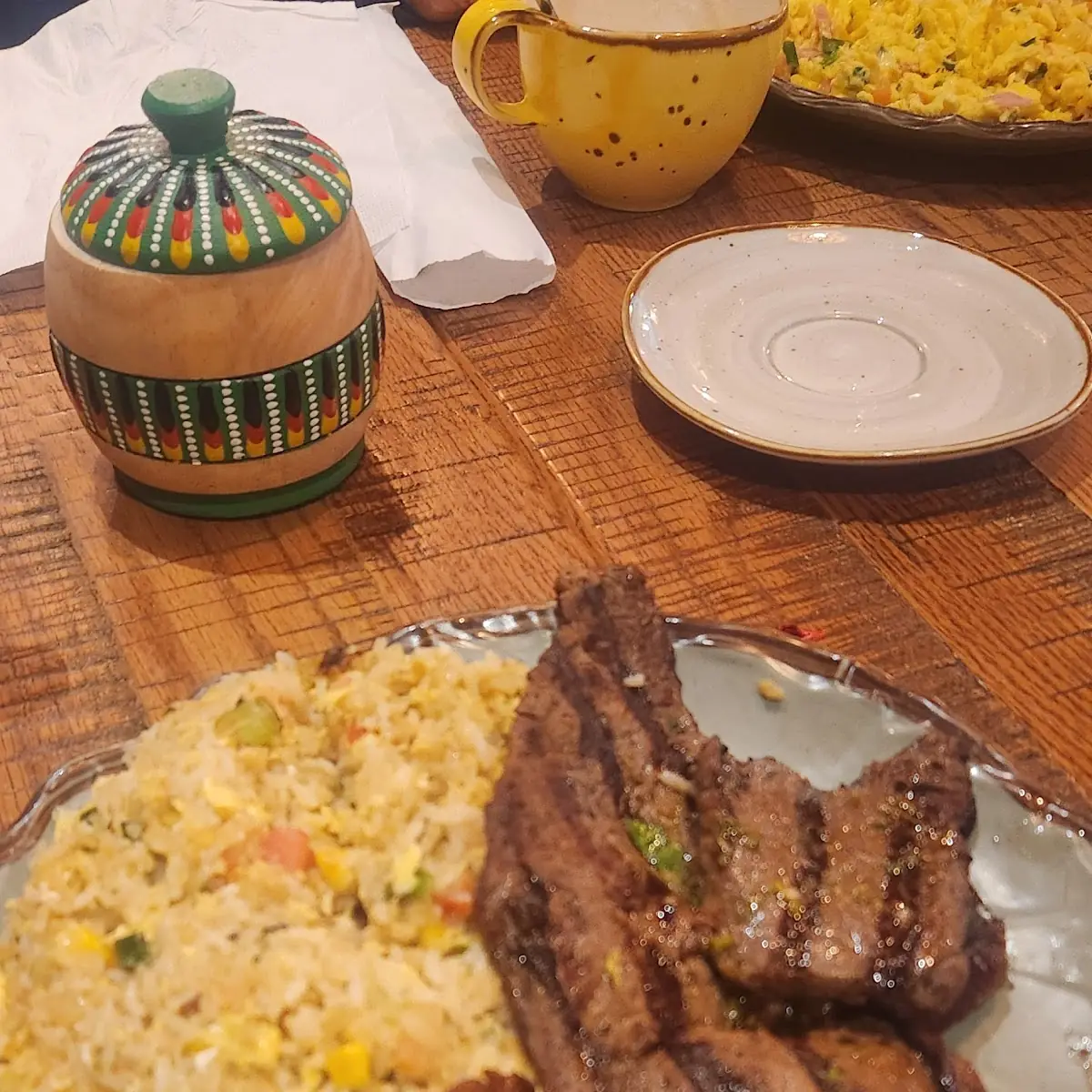 Carne Asada Con Migas Y Maduro