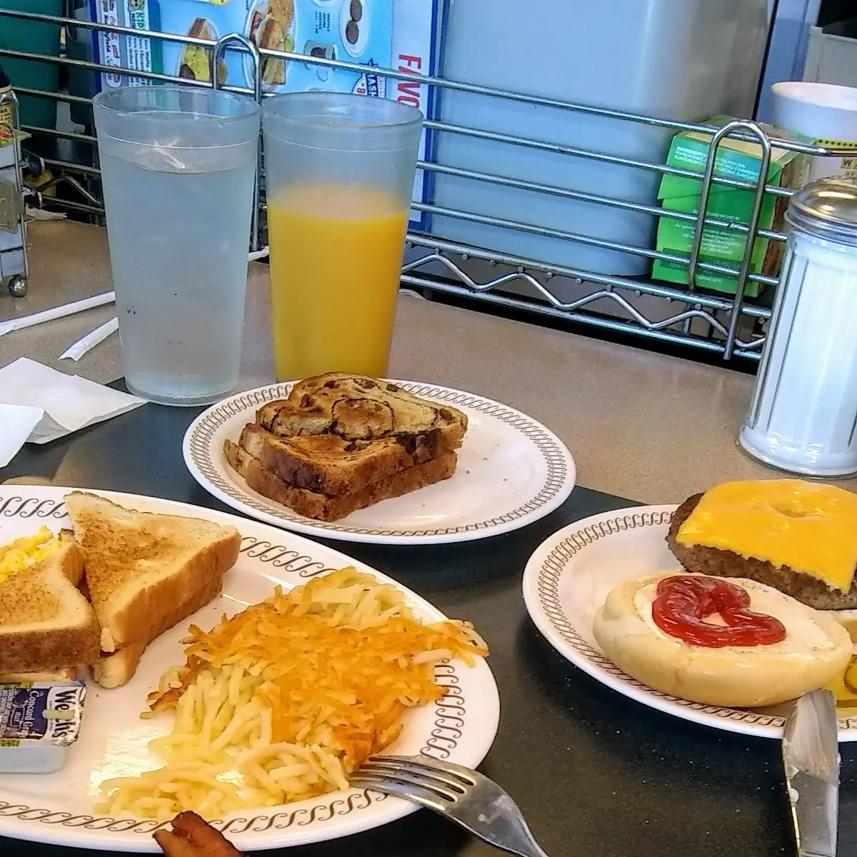 Bacon Toast Hash Browns Raisin Toast and a Cheeseburger