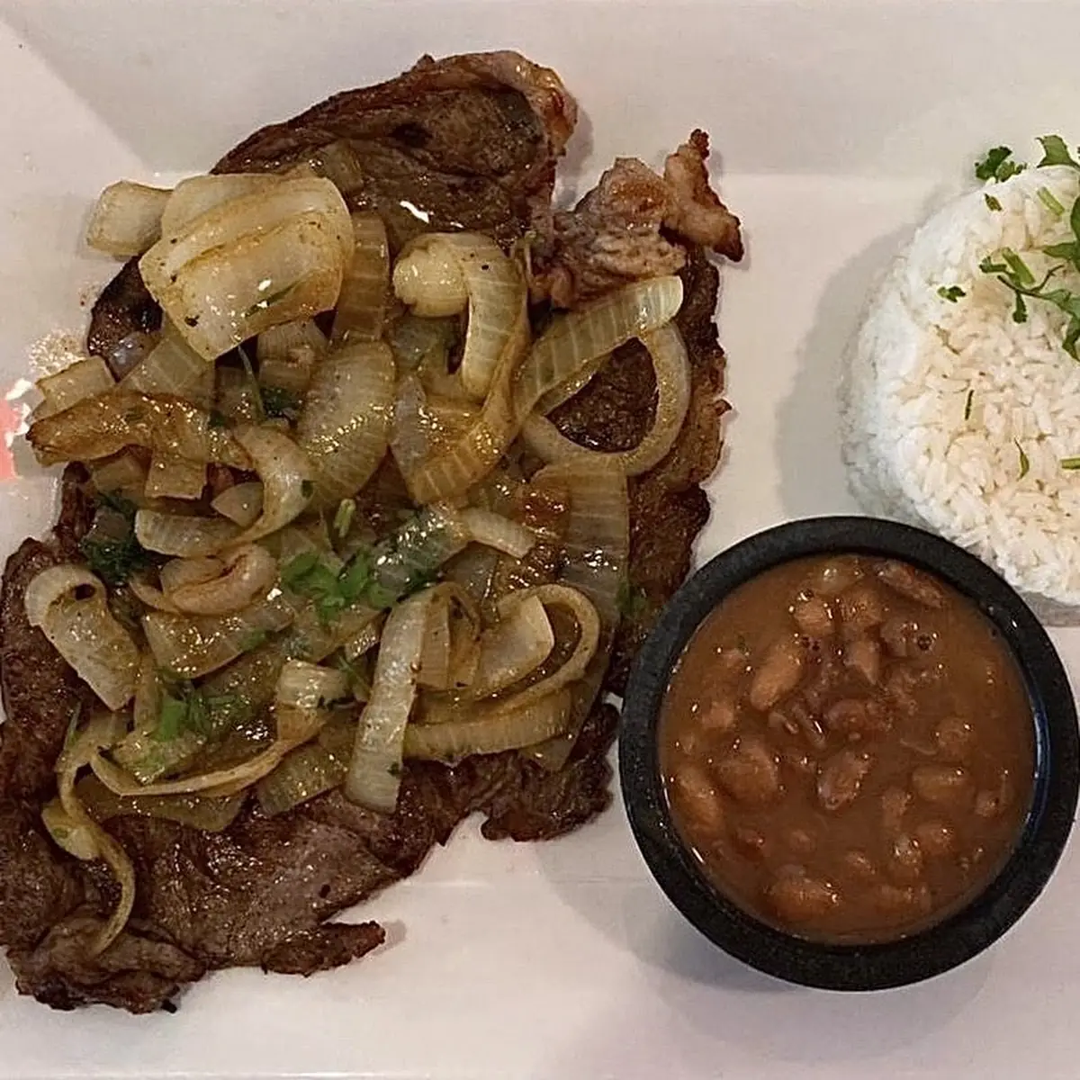 Bistec Encebollado Steak with Sautéed Onions