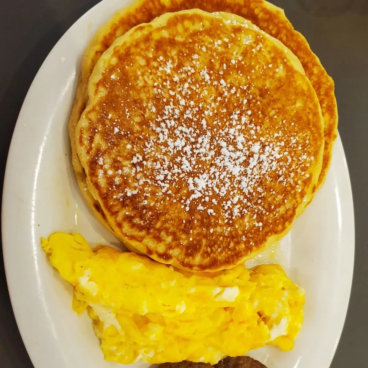 Pancakes Scrambled Eggs and Sausage