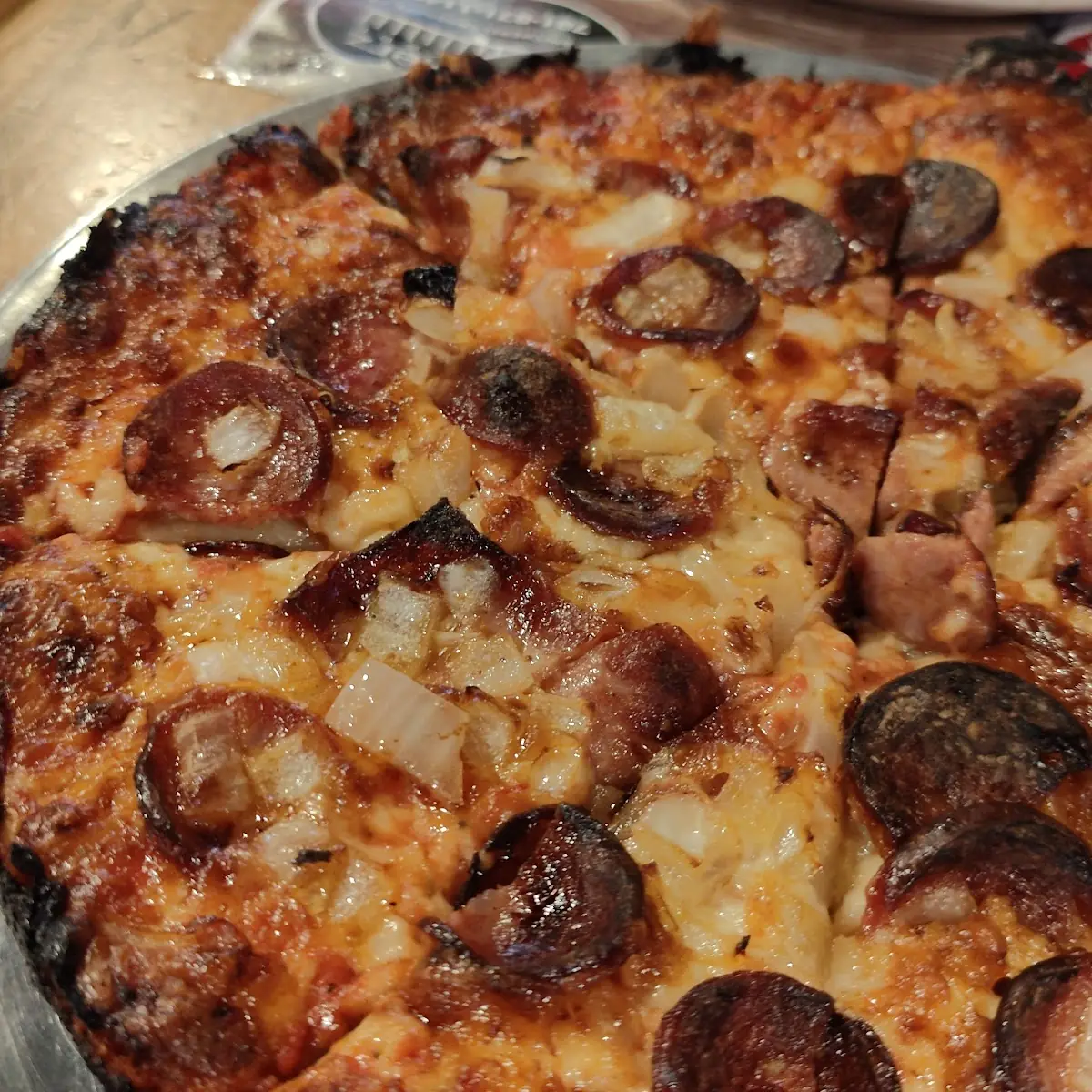 Linguica and Onion Pizza Laced and Well Done