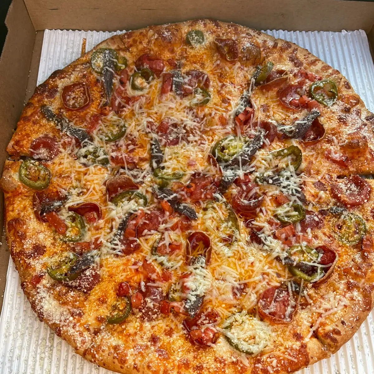 New York Round Cheese Pepperoni Peppers Pizza