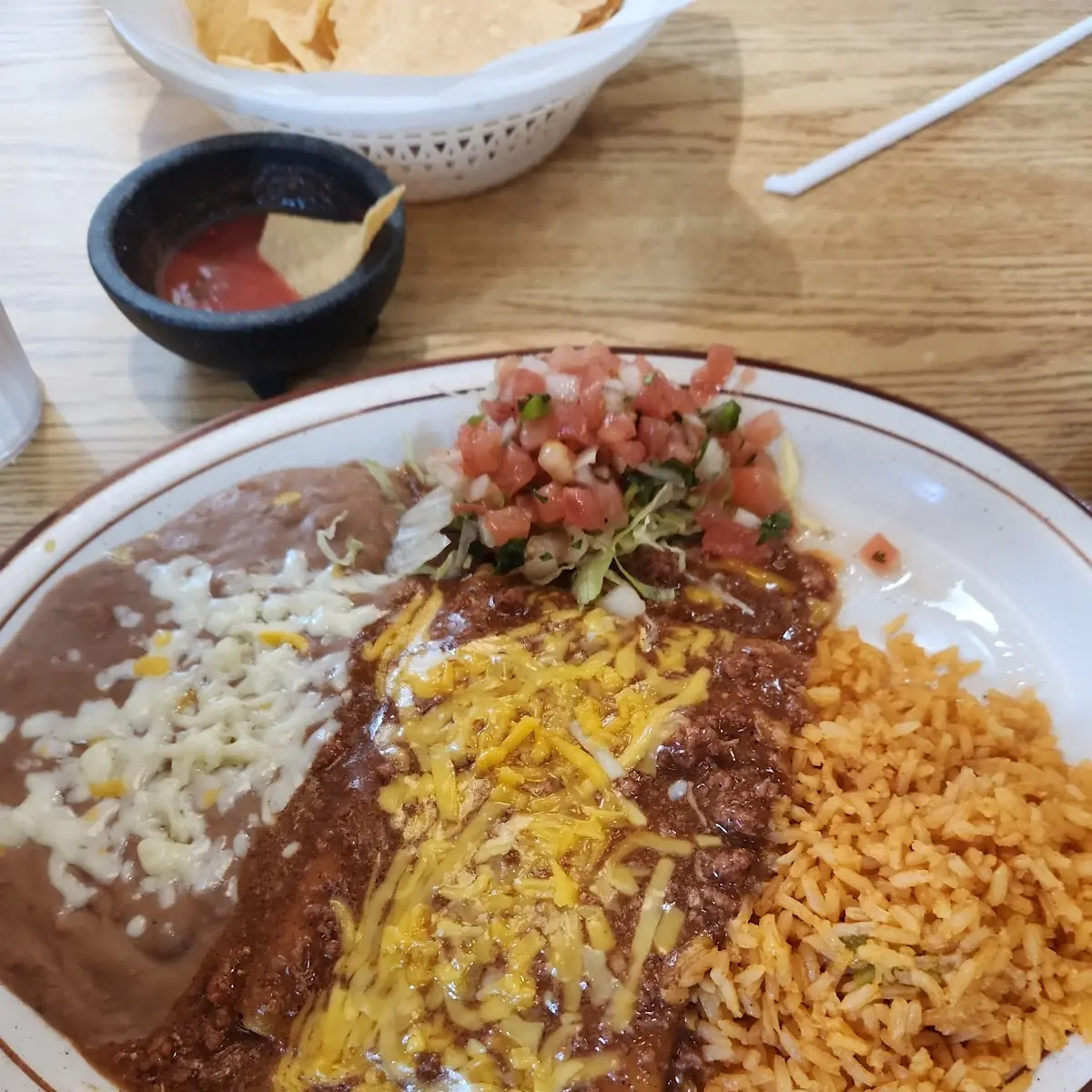 One Cheese Enchilada and & One Guacamole Tostada