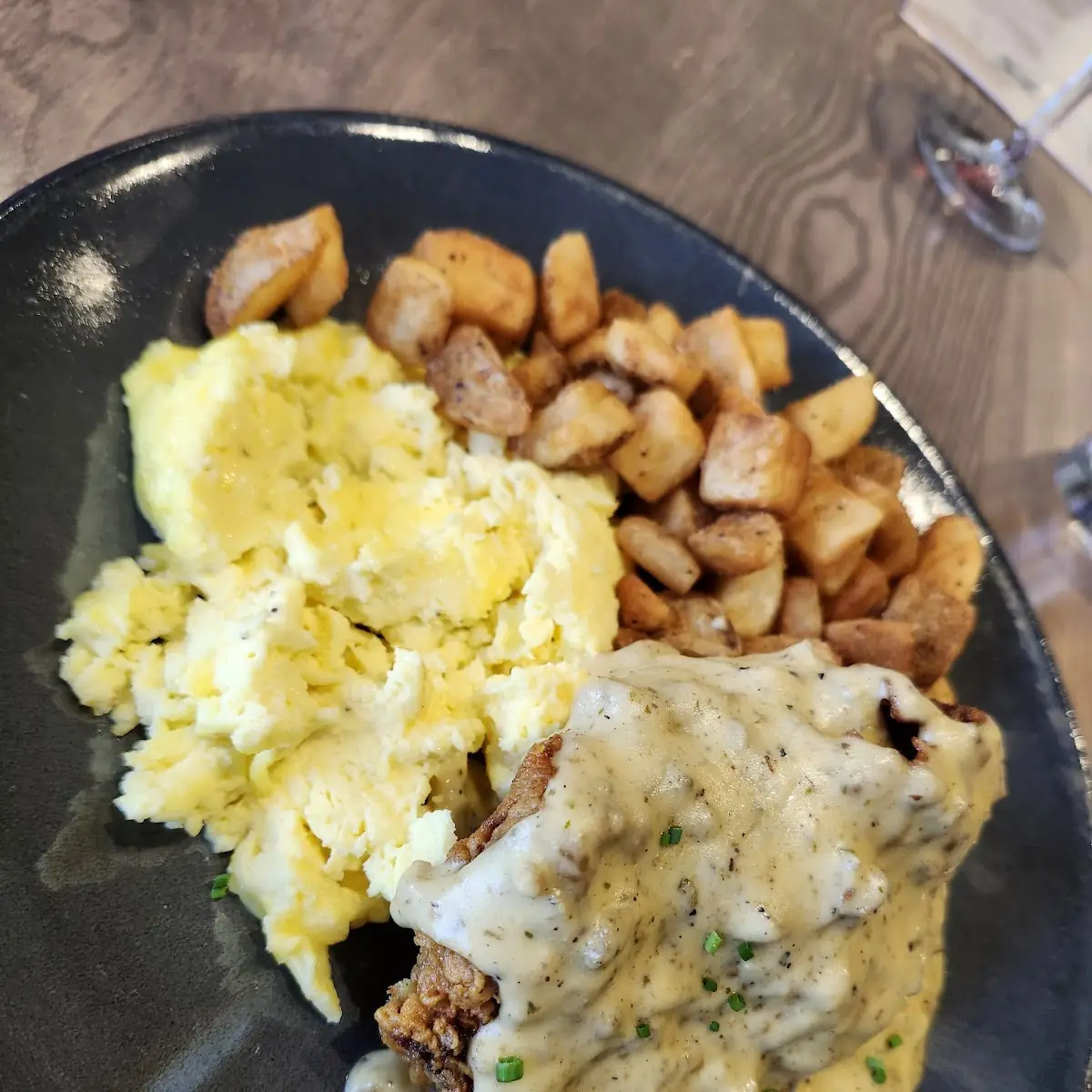 Chicken Fried Steak with Scrambled Eggs and Potatoes