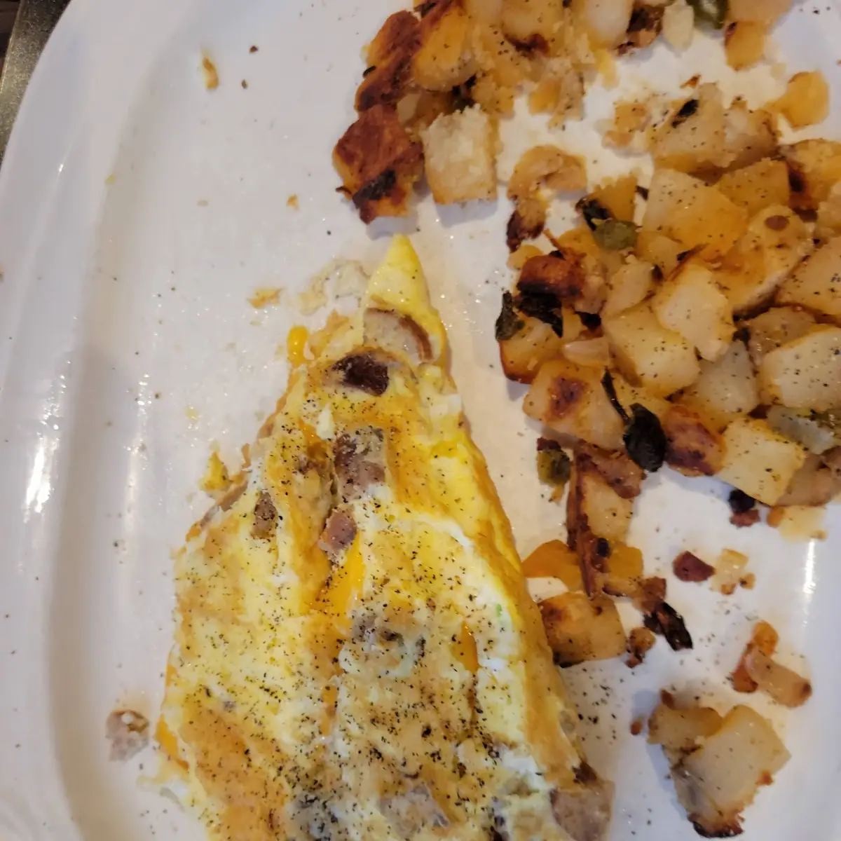 Chorizo Bacon Potato and Cheddar Omelet