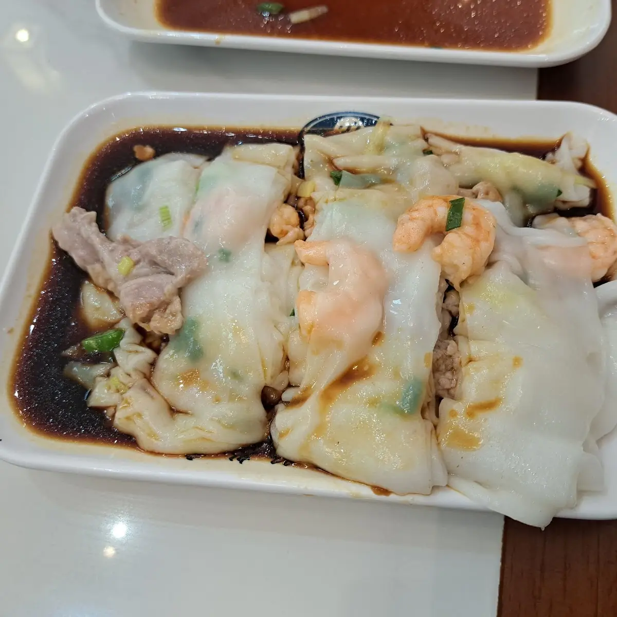 Steamed Rice Rolls in Soy Sauce
