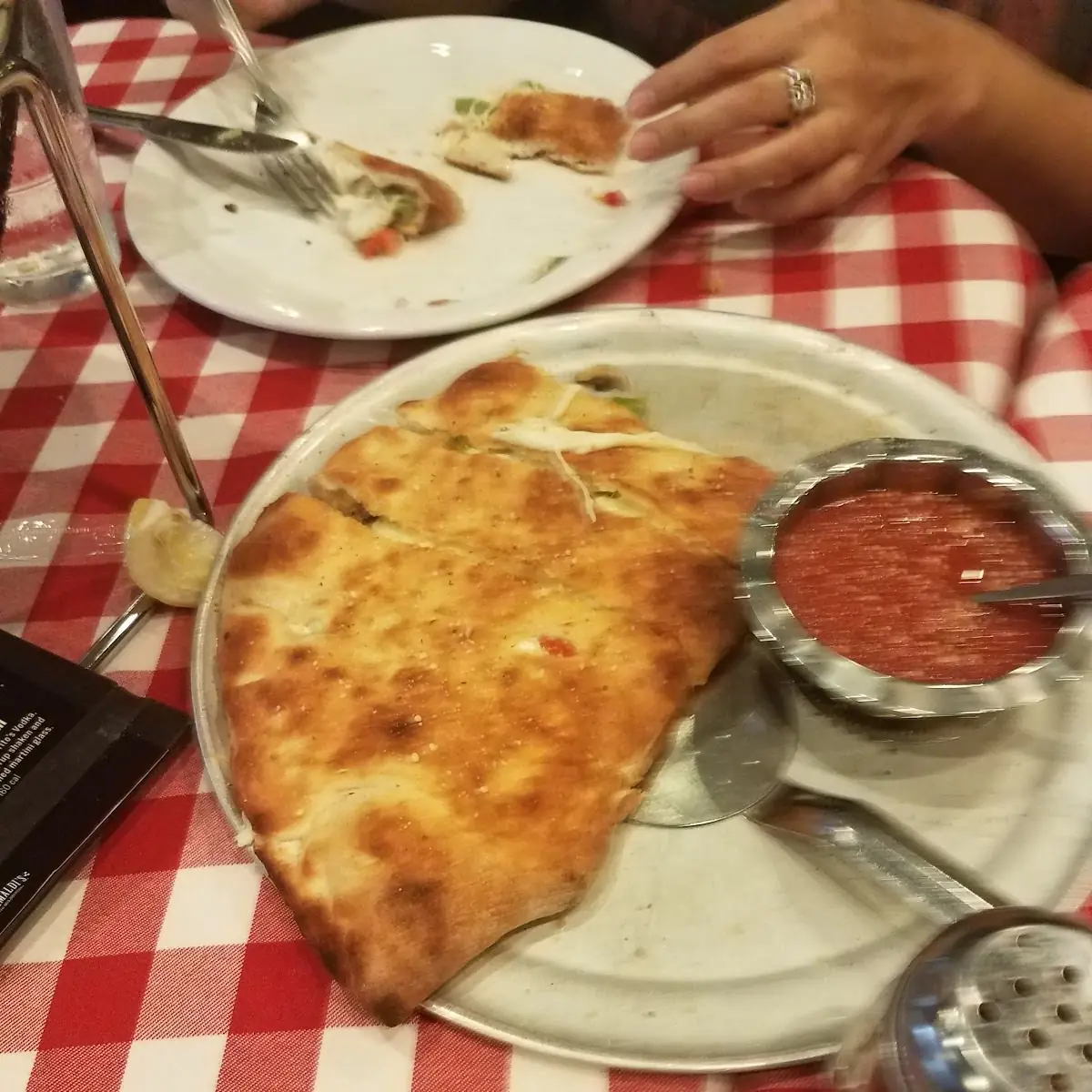 Pepperoni Calzone with a Slice Removed