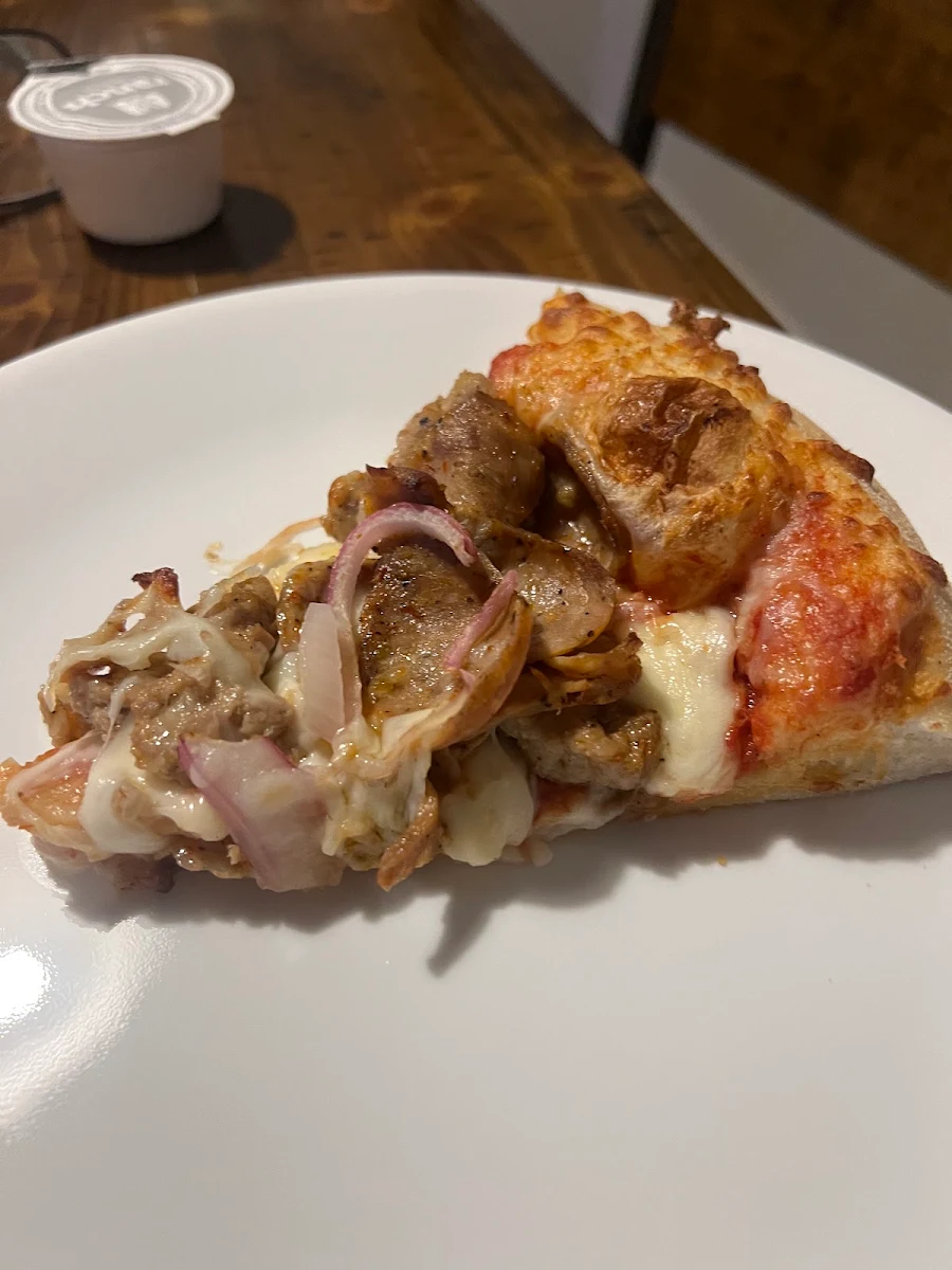 Sausage Magnifico Pizza Slice