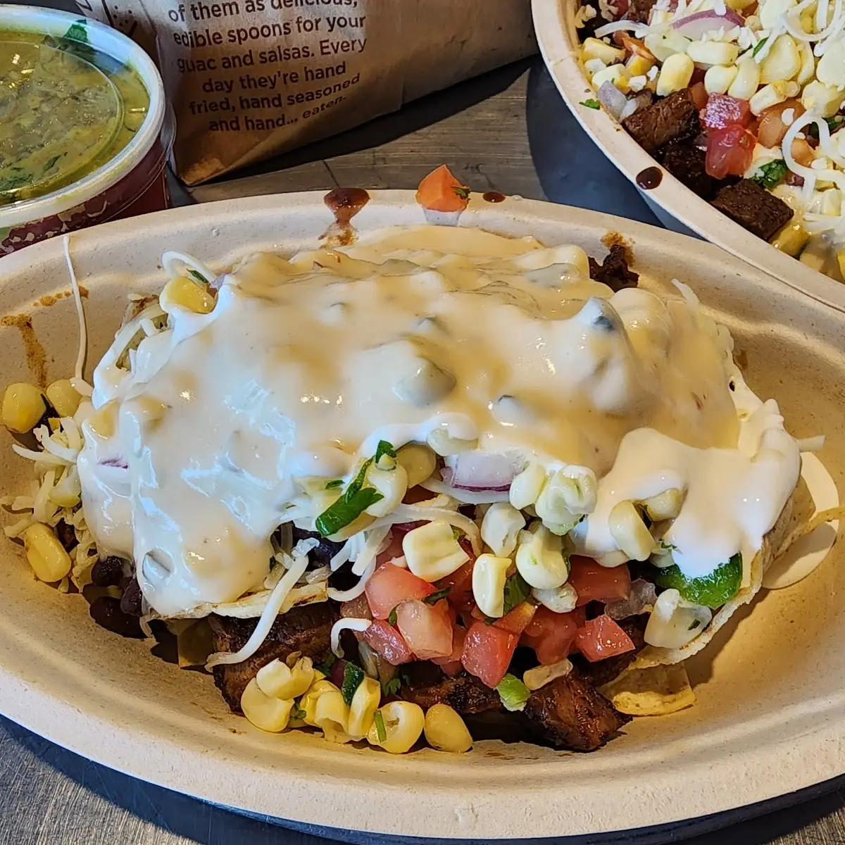 Beef Burrito Bowl over Chips and Guacamole