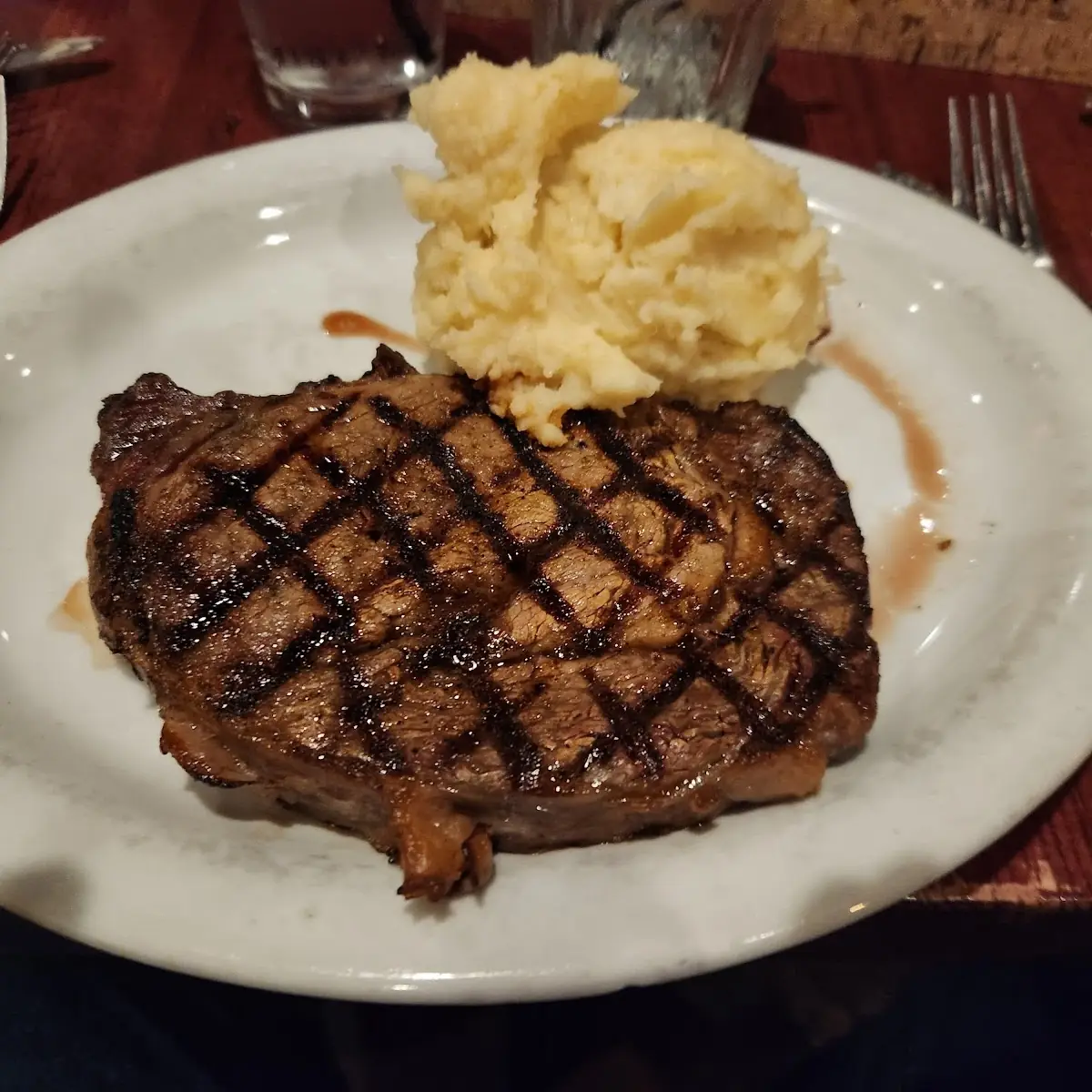 12oz Ribeye Steak with Garlic Mashed Potatoes