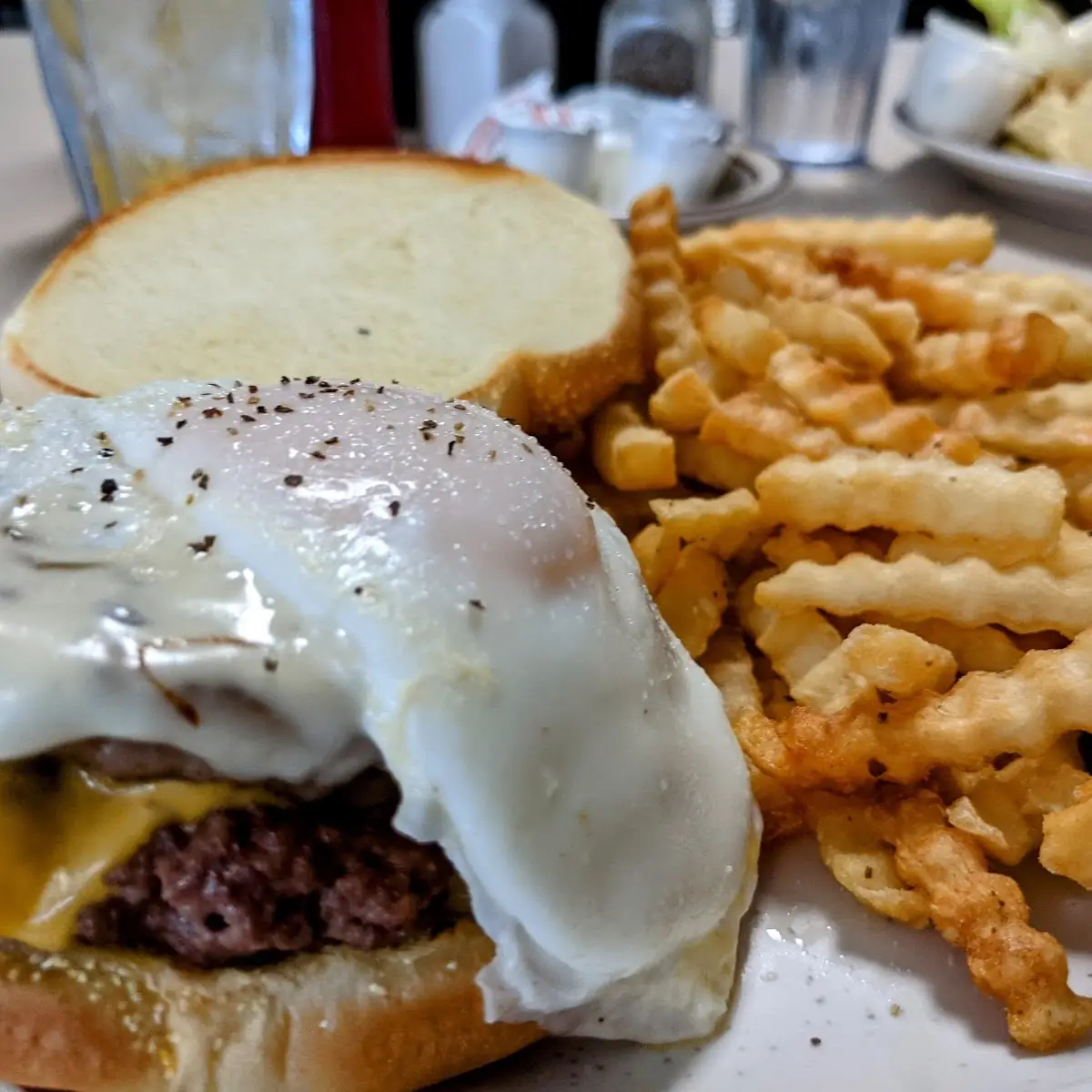 #10. Burger Patty (5 oz), 2 Eggs, Hash Browns & Toast