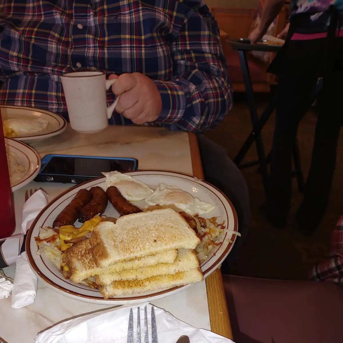 Eggs Sausage Hash Browns and Toast
