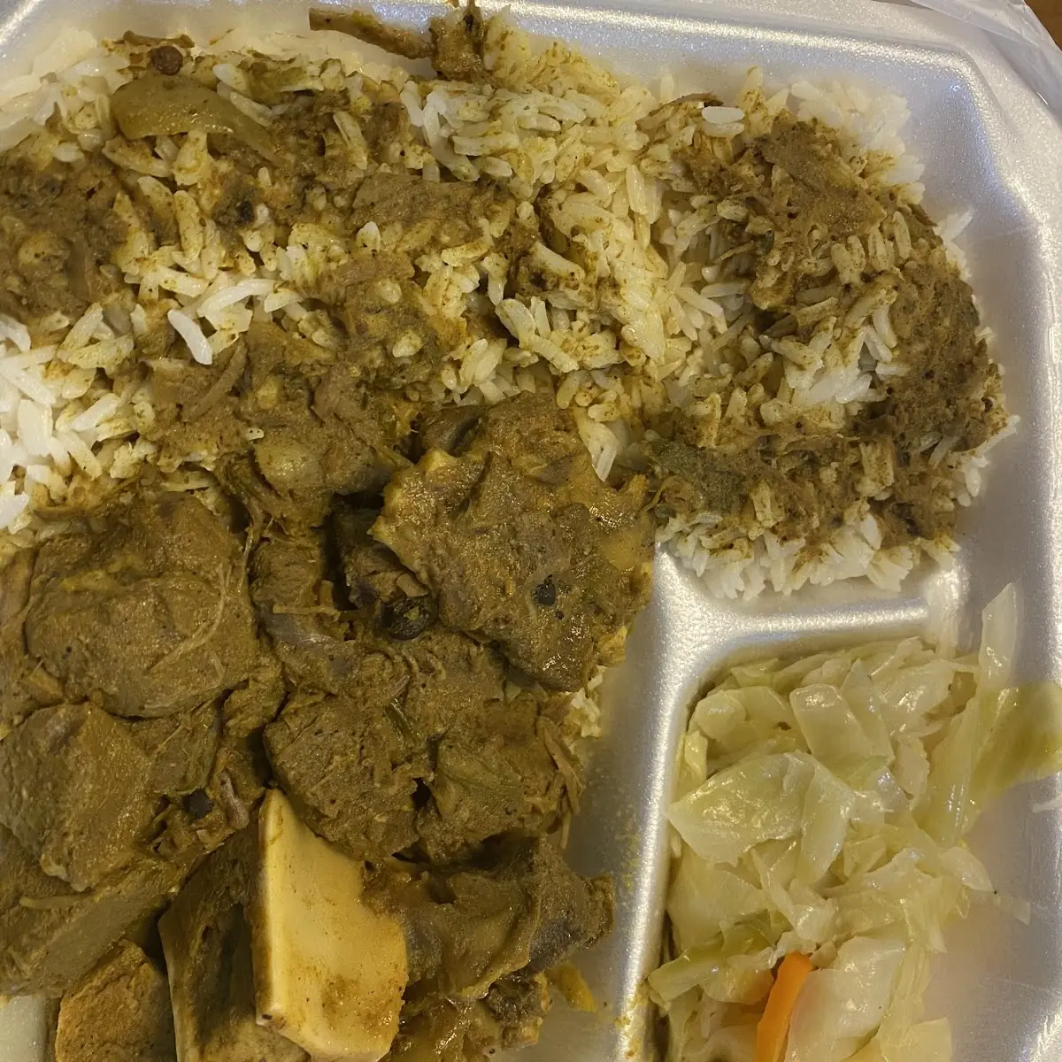 Curry Goat Cabbage and White Rice