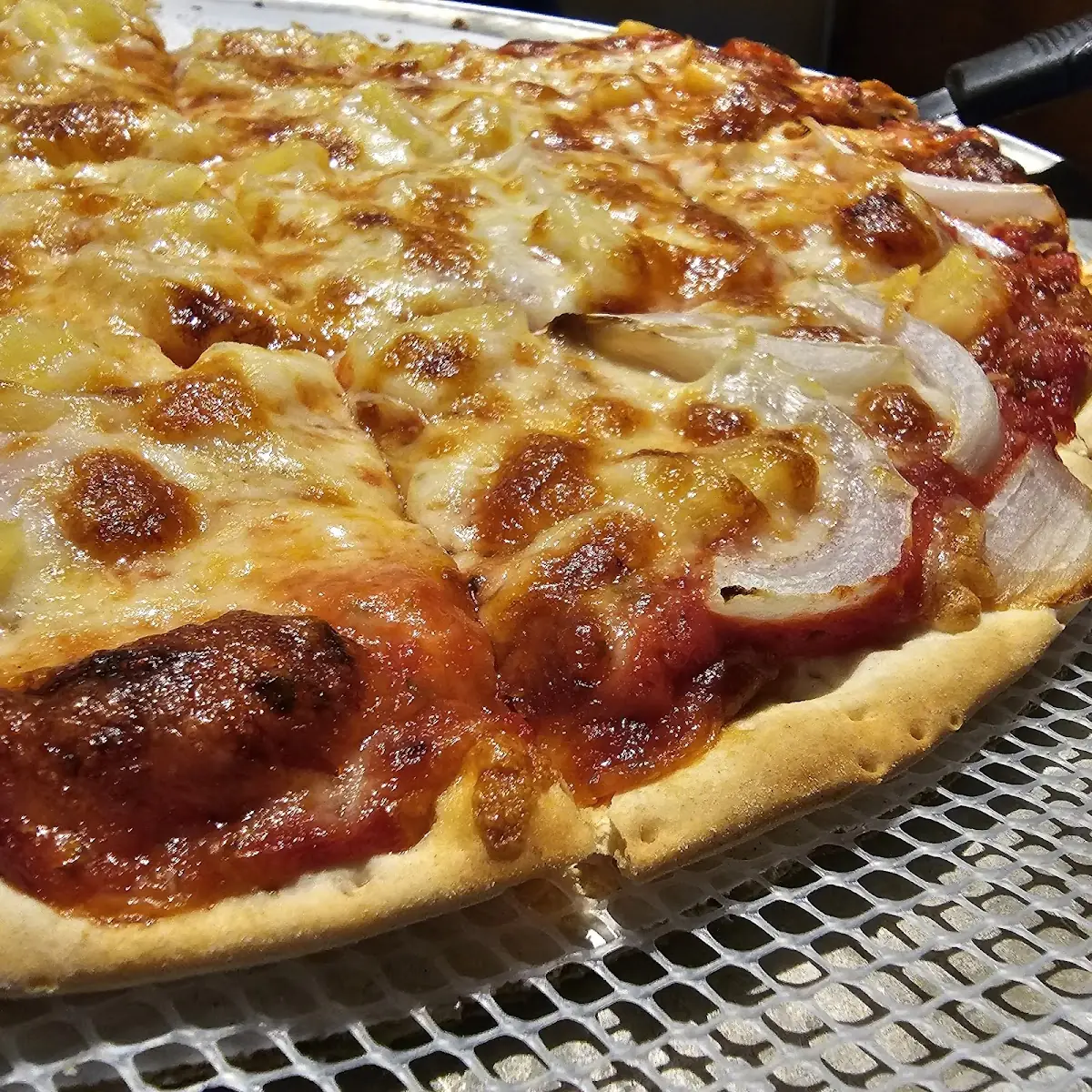Thin Crust Cheese Pineapple Ham and Onion Pizza