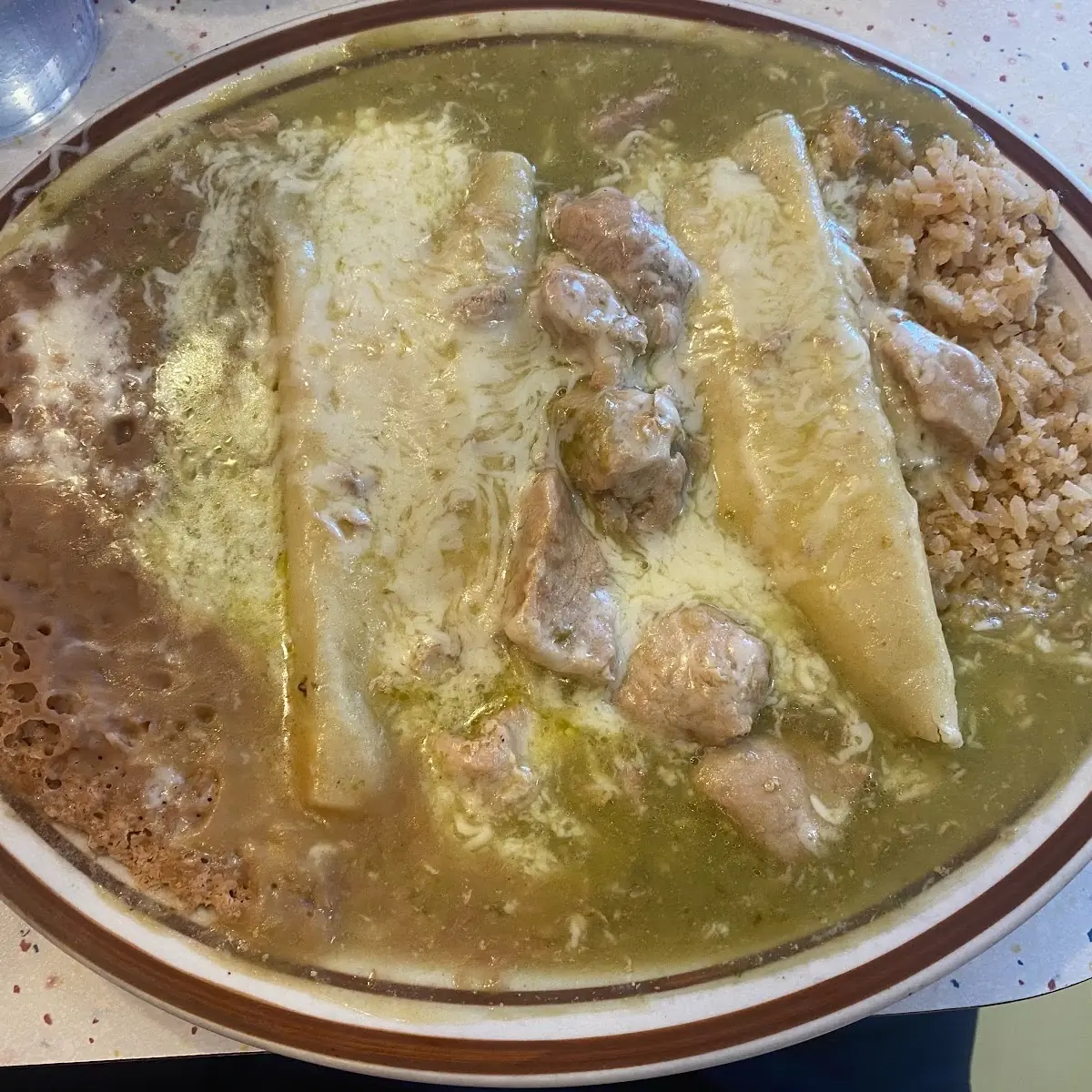 9a. One Cheese Enchilada Served with Chile Verde