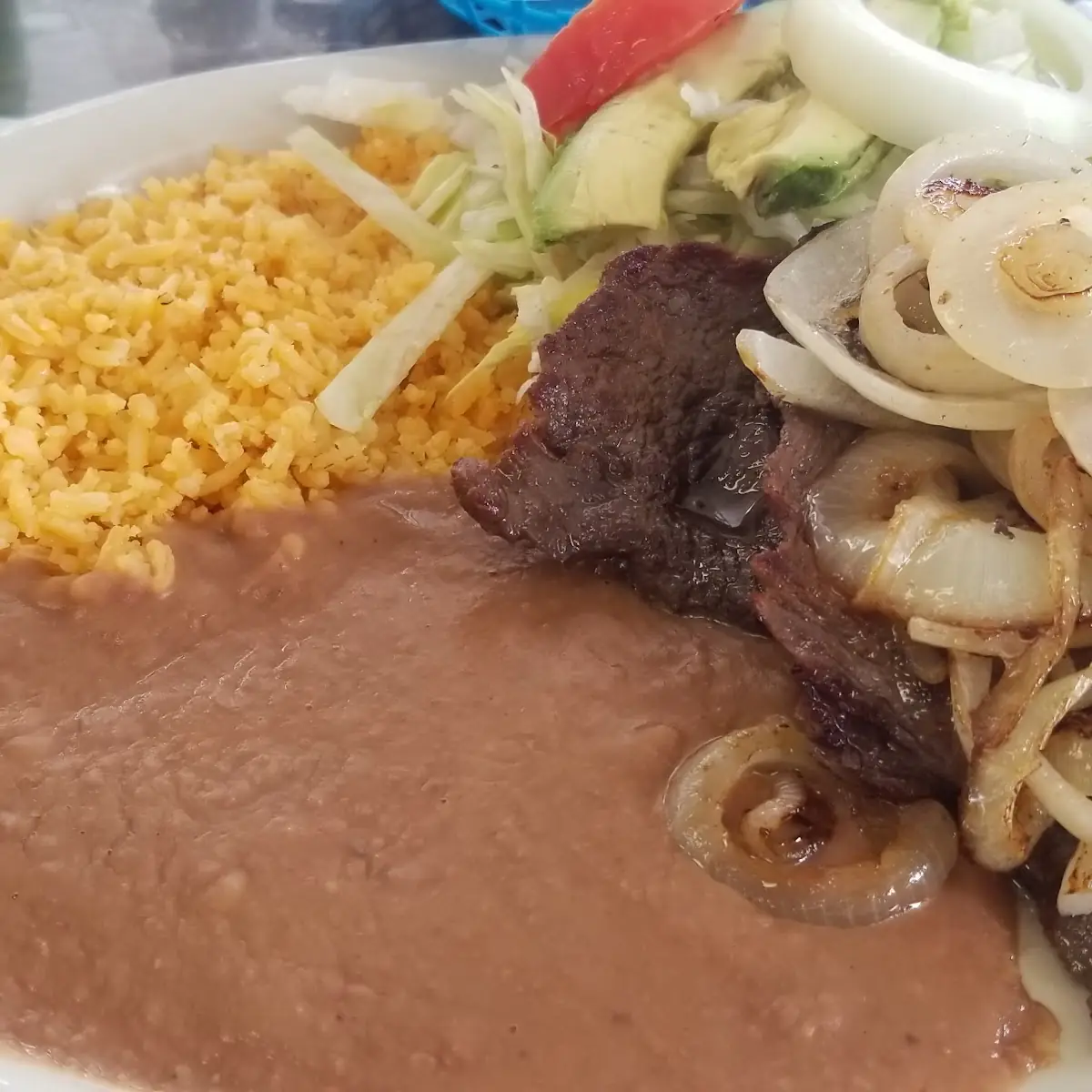Bistec Encebollado