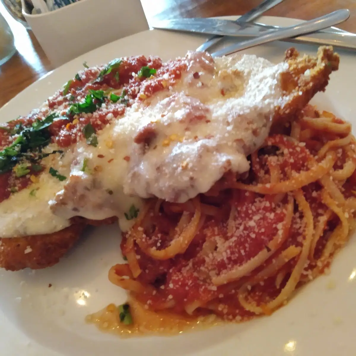 Veal Parmigiana over Spaghetti