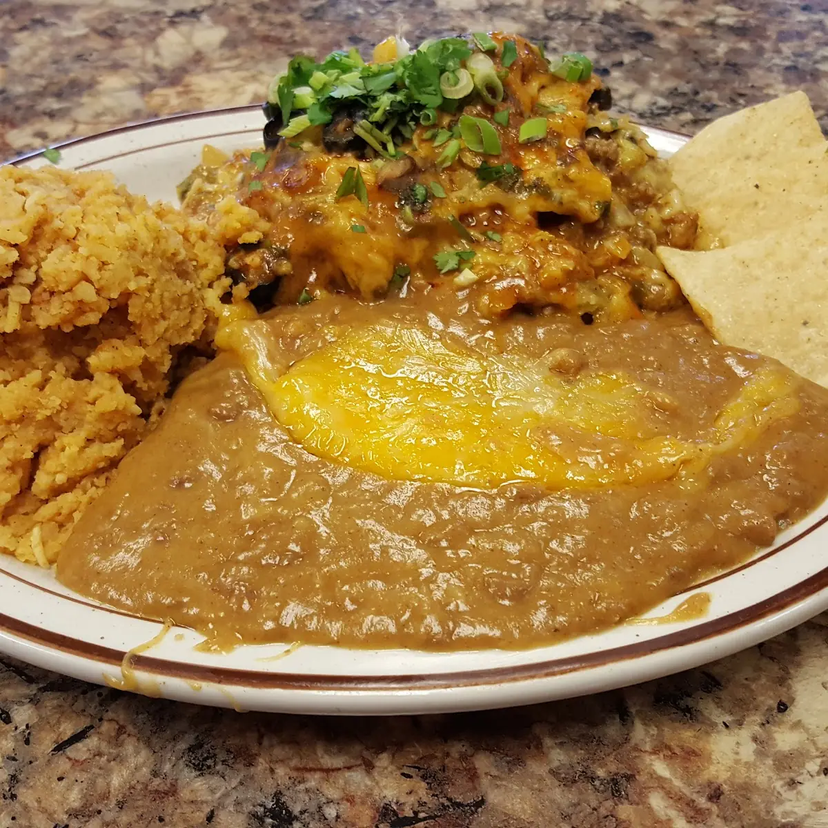 Enchiladas Spanish Rice and Refried Beans