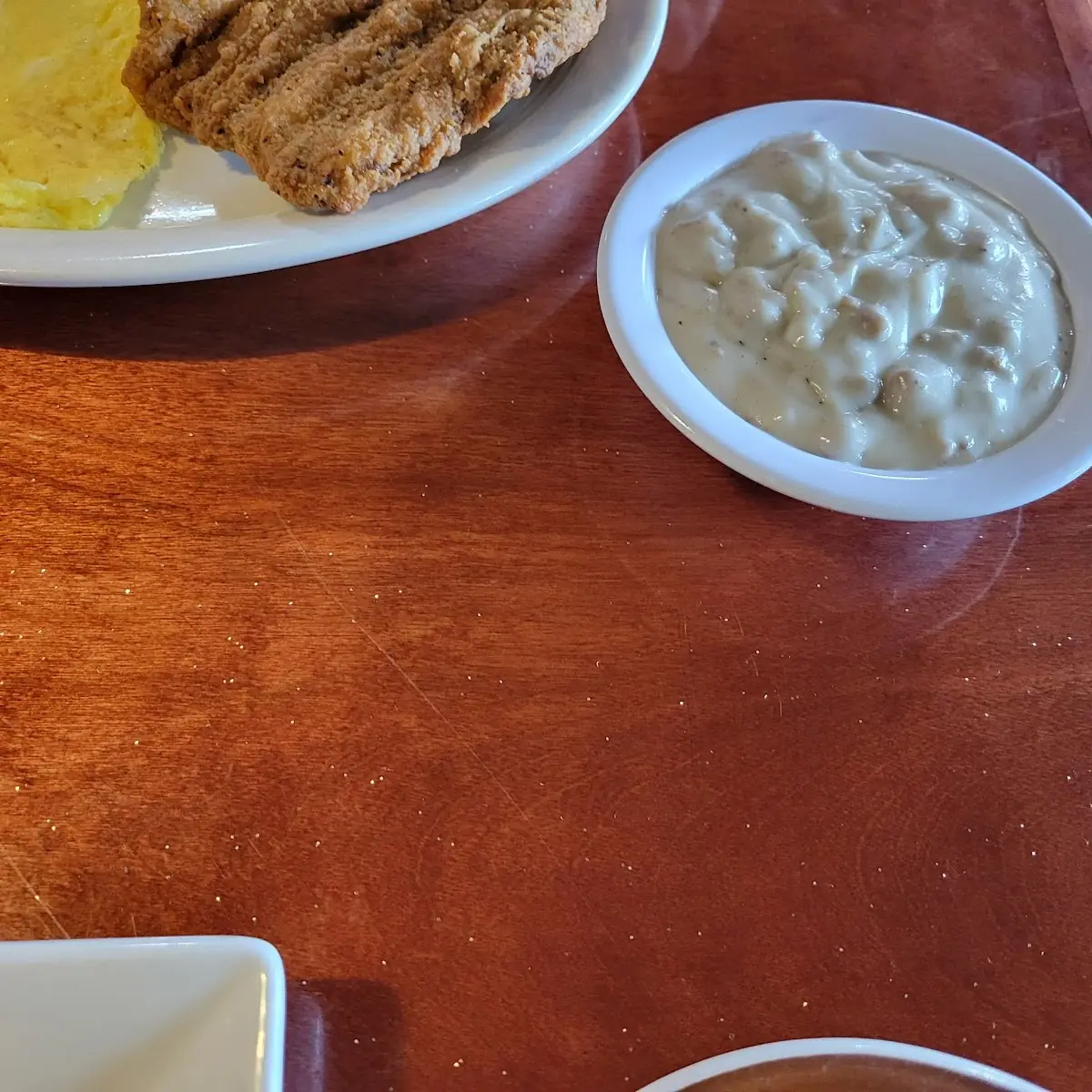 Two Eggs with Potatoes Grits & Fresh OJ