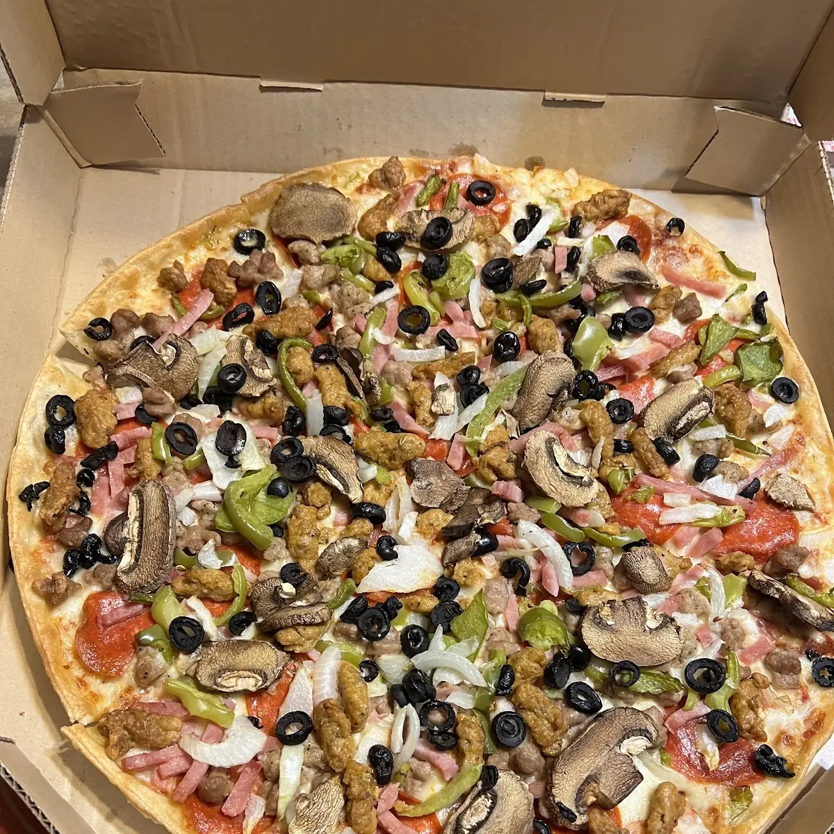 Thin Crust Super Supreme Pizza