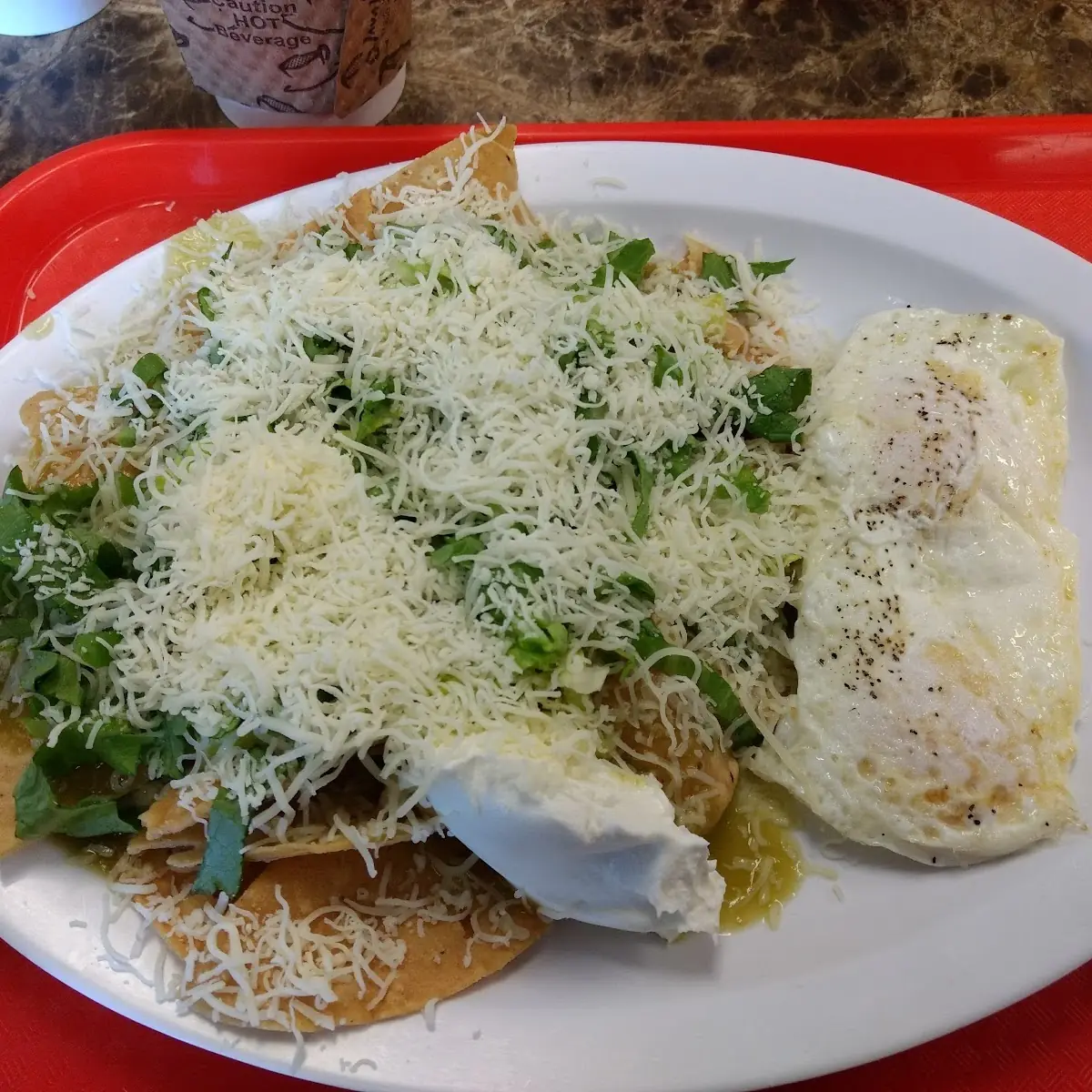 Chilaquiles Verdes with Eggs over Easy