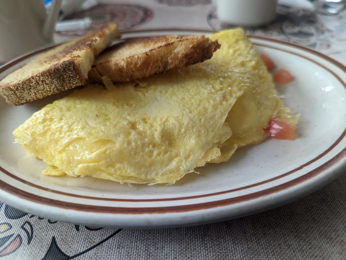 Omelet with Tomato Mozzarella and Basil