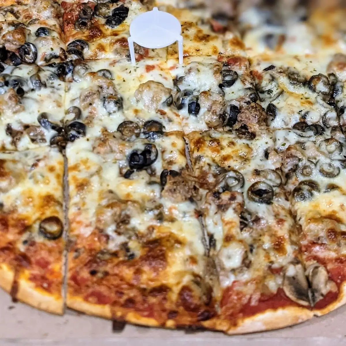 Sausage Mushroom Black Olive Pizza