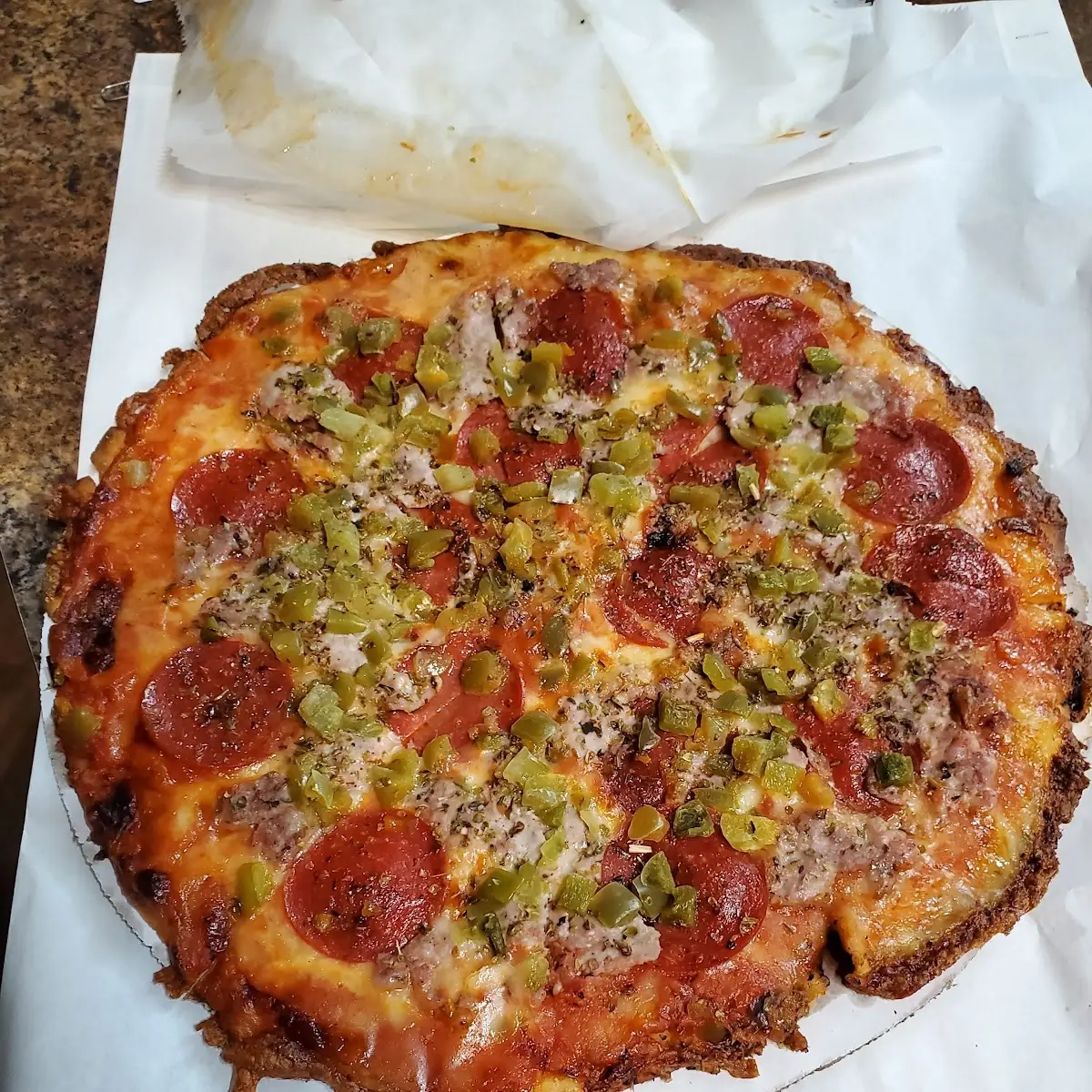 Pizza with Sausage Pepperoni and Green Peppers