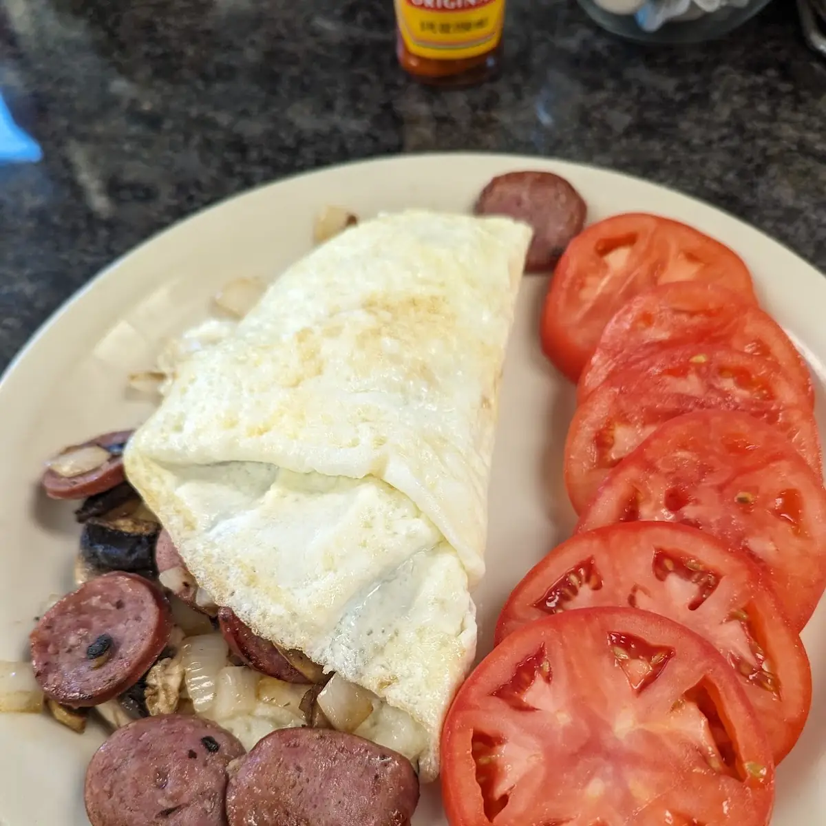 Egg White Omelette with Kielbasa and Sliced Tomatoes