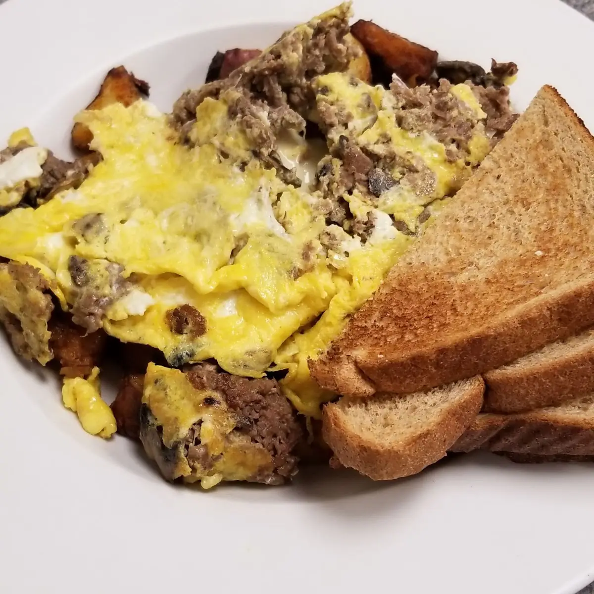 Shaved Steak & Cheese or Smothered Hash