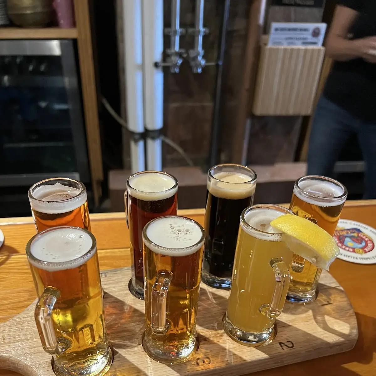 Assorted Beer Flight on Wooden Paddle
