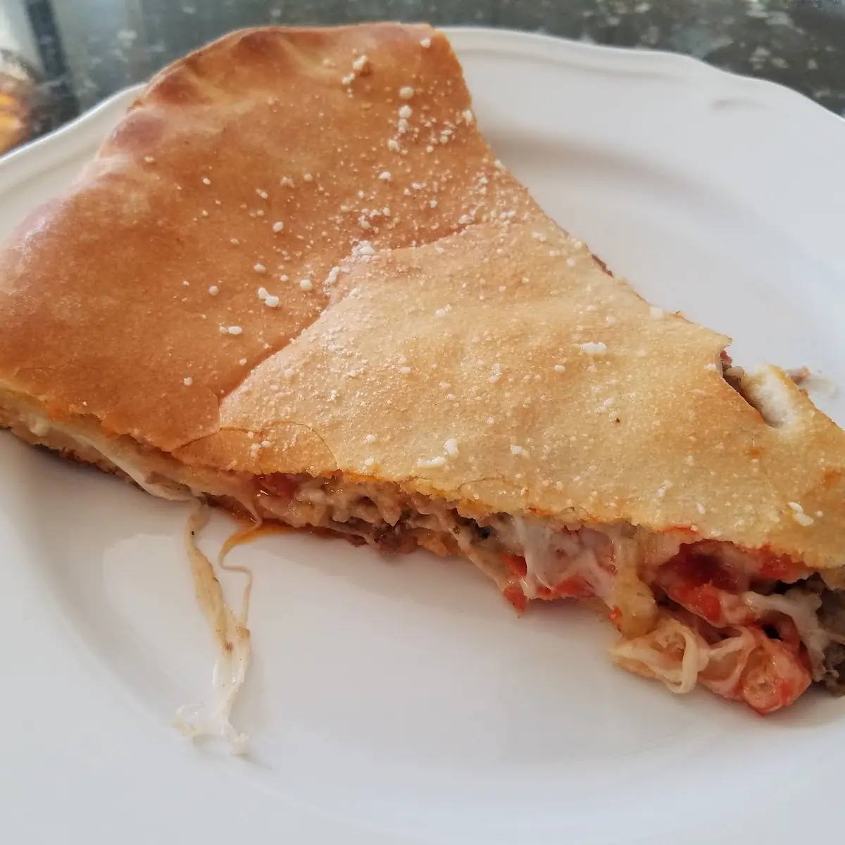 Slice of Stuffed 3-Meat Pizza