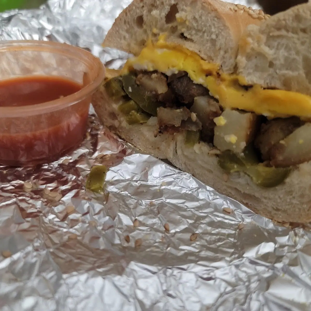 Potato Egg American Cheese on Bagel Sandwich