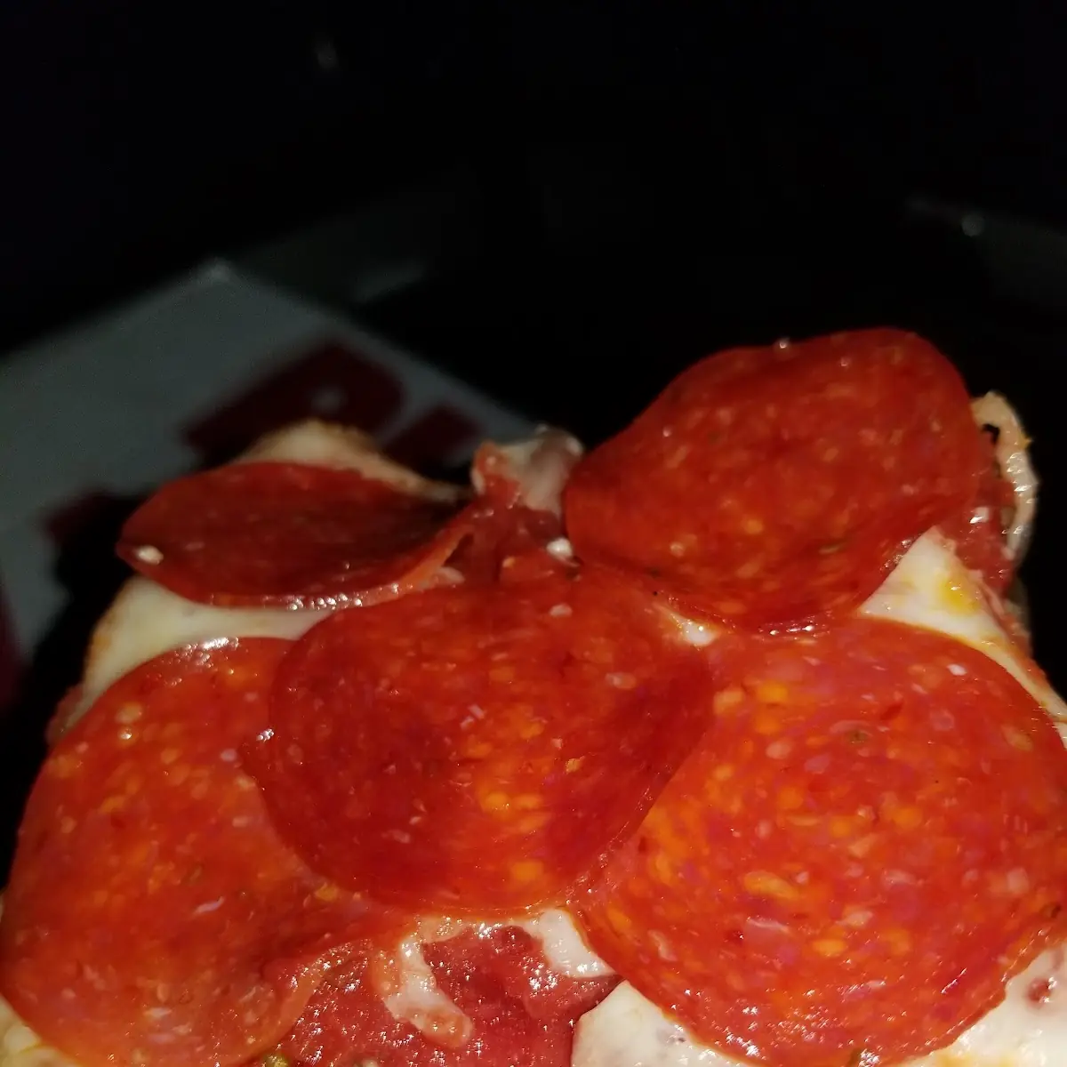 Slice of Pepperoni Pizza
