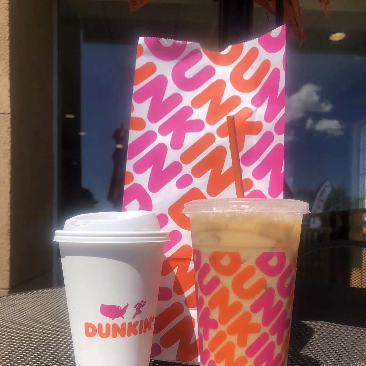 Medium Iced Vanilla Latte with Almond Milk Two Donuts and a Hot Vanilla Latte