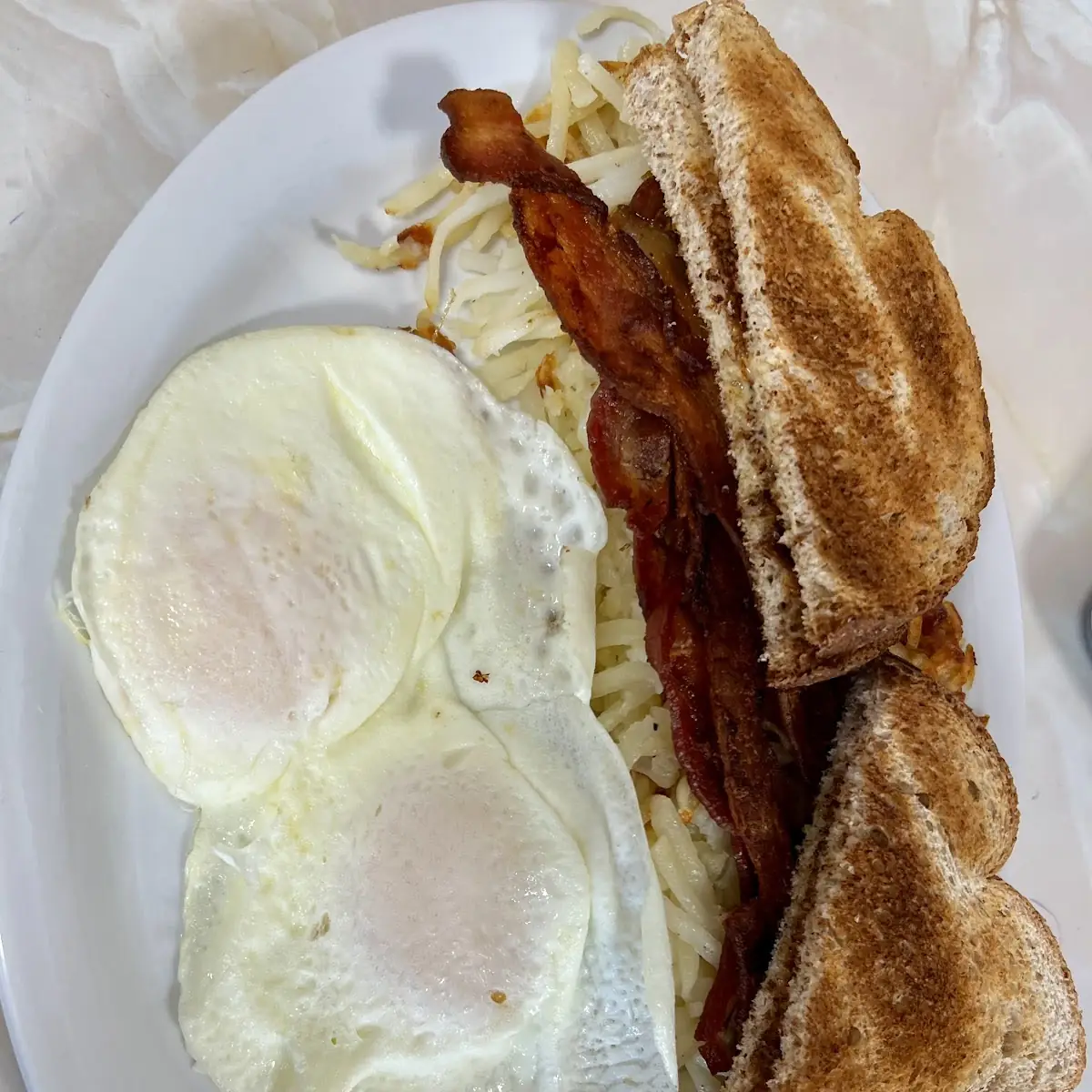 2 Eggs Any Style with Bacon Hashbrowns & Toast