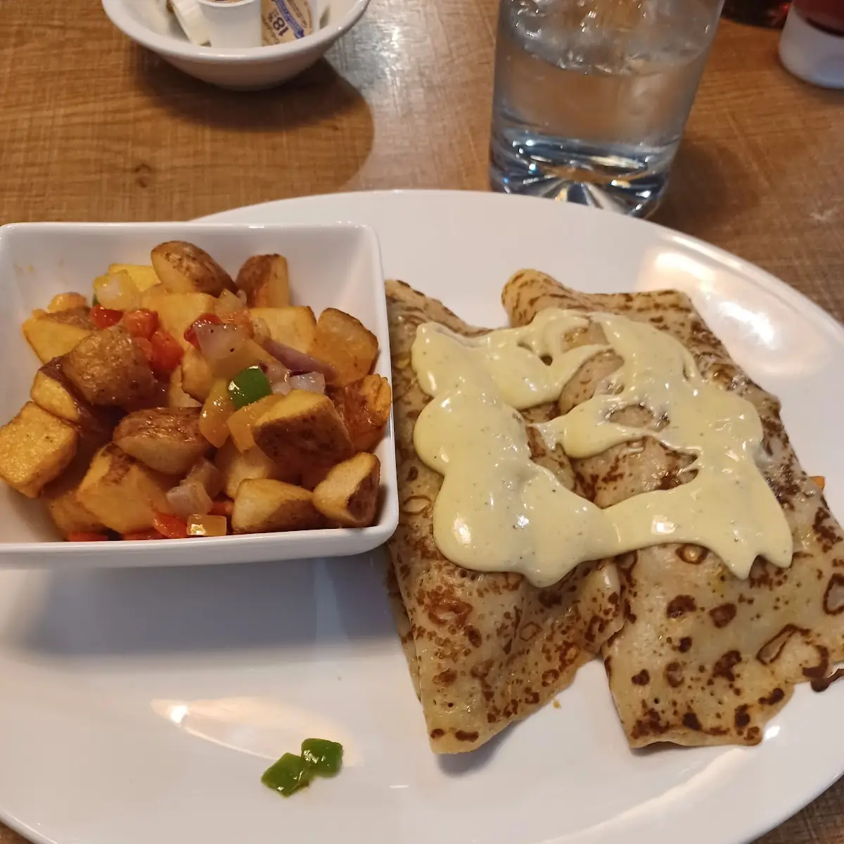 Chorizo & Eggs Benedict with Cubed Hashbrowns