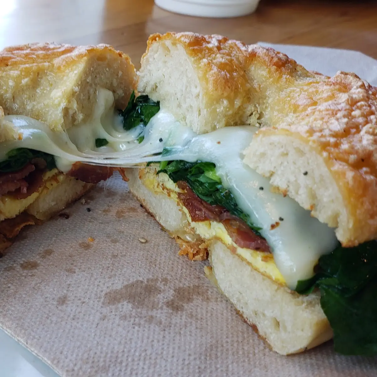 Bacon Egg Cheese Spinach Cheese Bagel