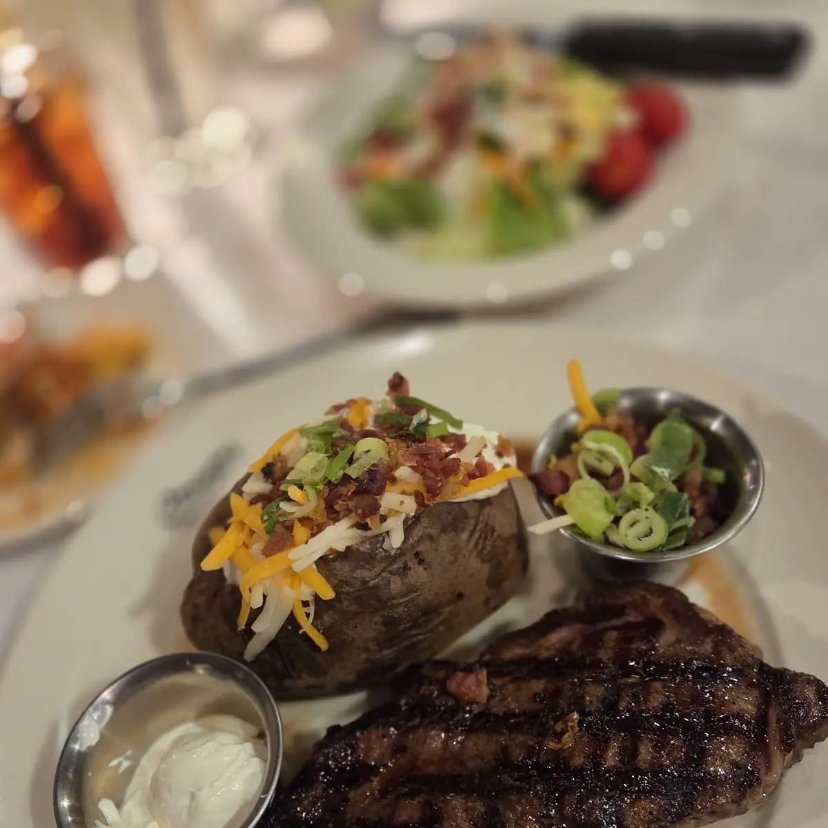 Ribeye Steak and Fully Loaded Baked Potato