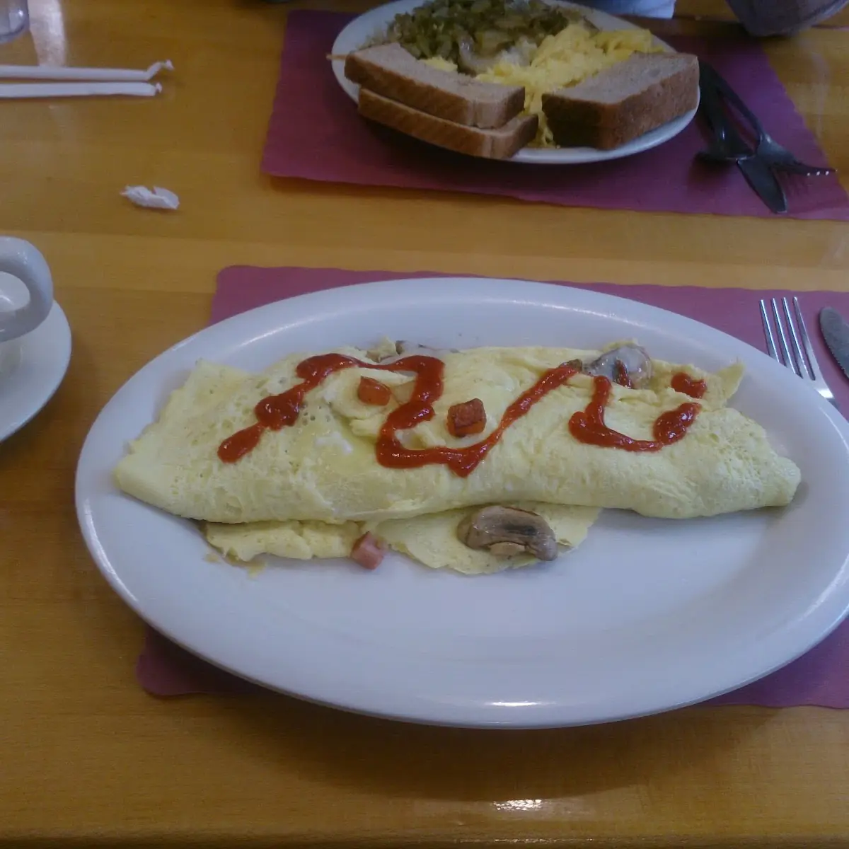 #27. Spicy Sausage, Pepper, Onions and Cheese Omelet