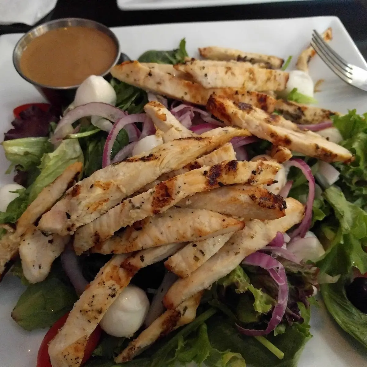 Blackened Chicken Salad with Mango Shredded Jack Cheese Crispy Onions Ranch Dressing