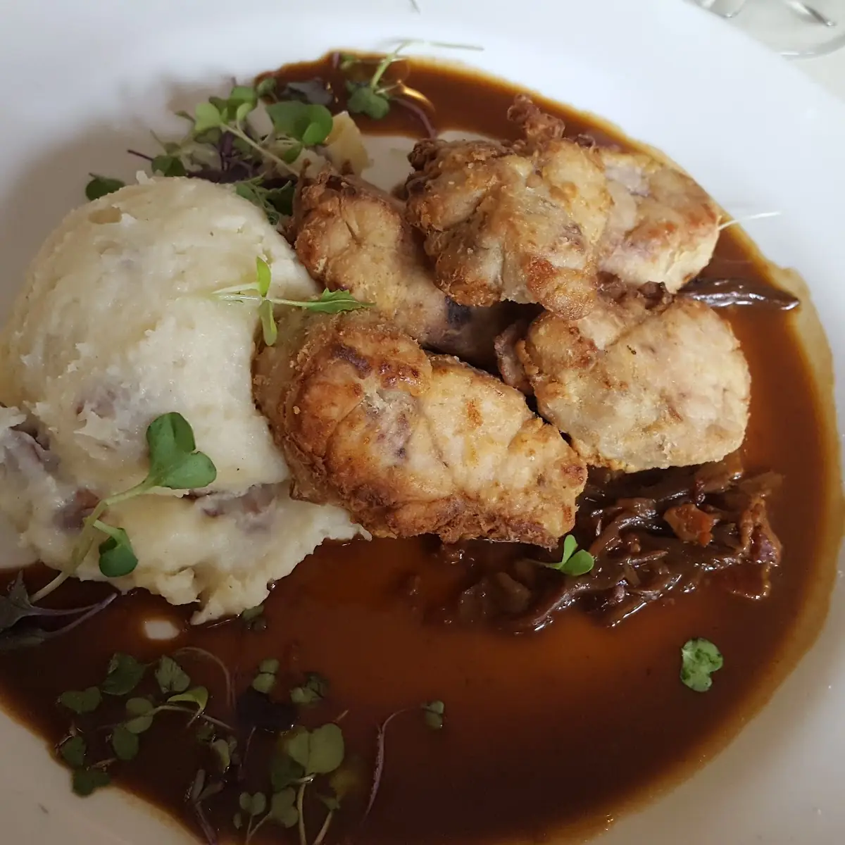 Fried Chicken Roulade Stuffed with Cheddar Corn Bread Green Beans Potatoes Onion Gravy