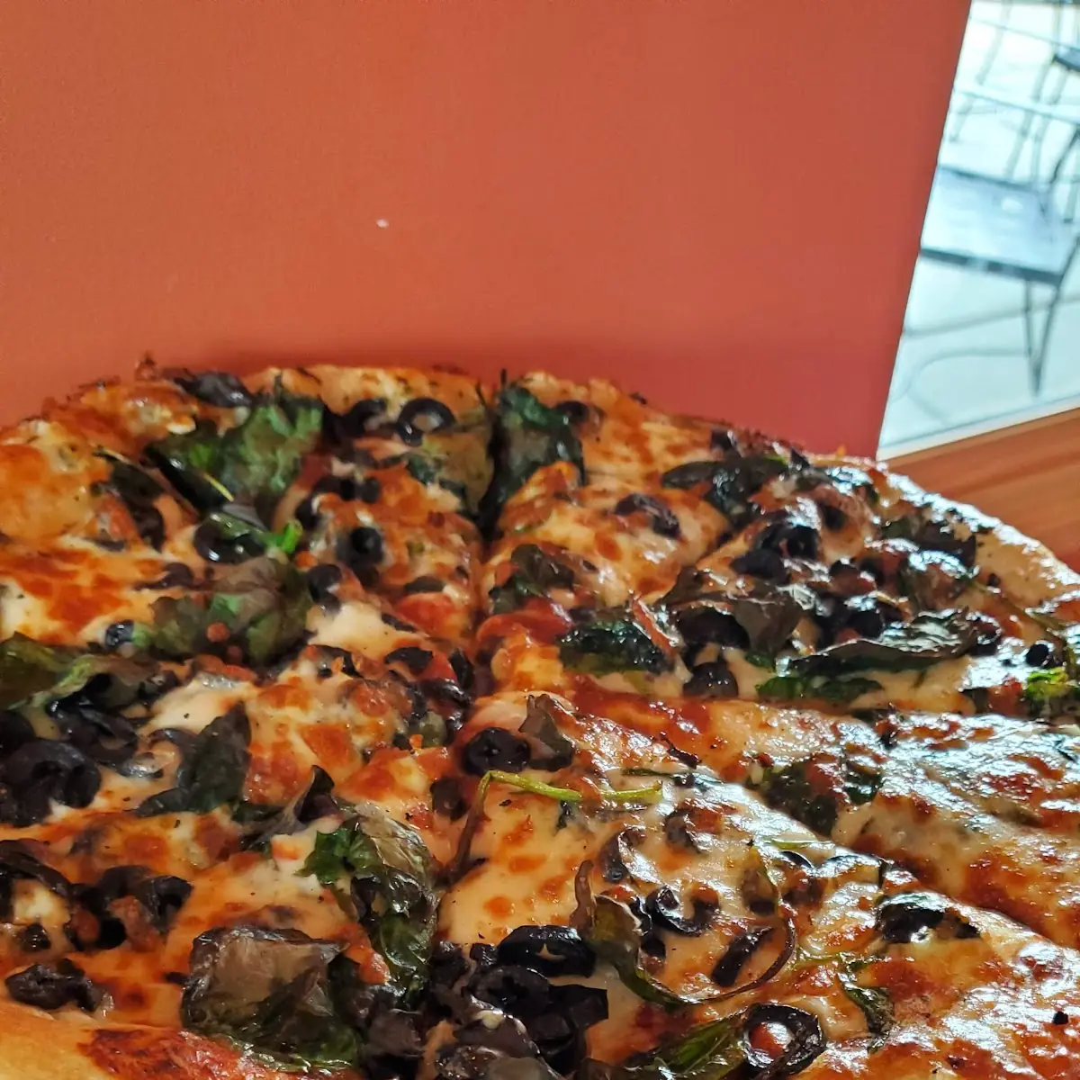 Black Olive and Spinach Pizza