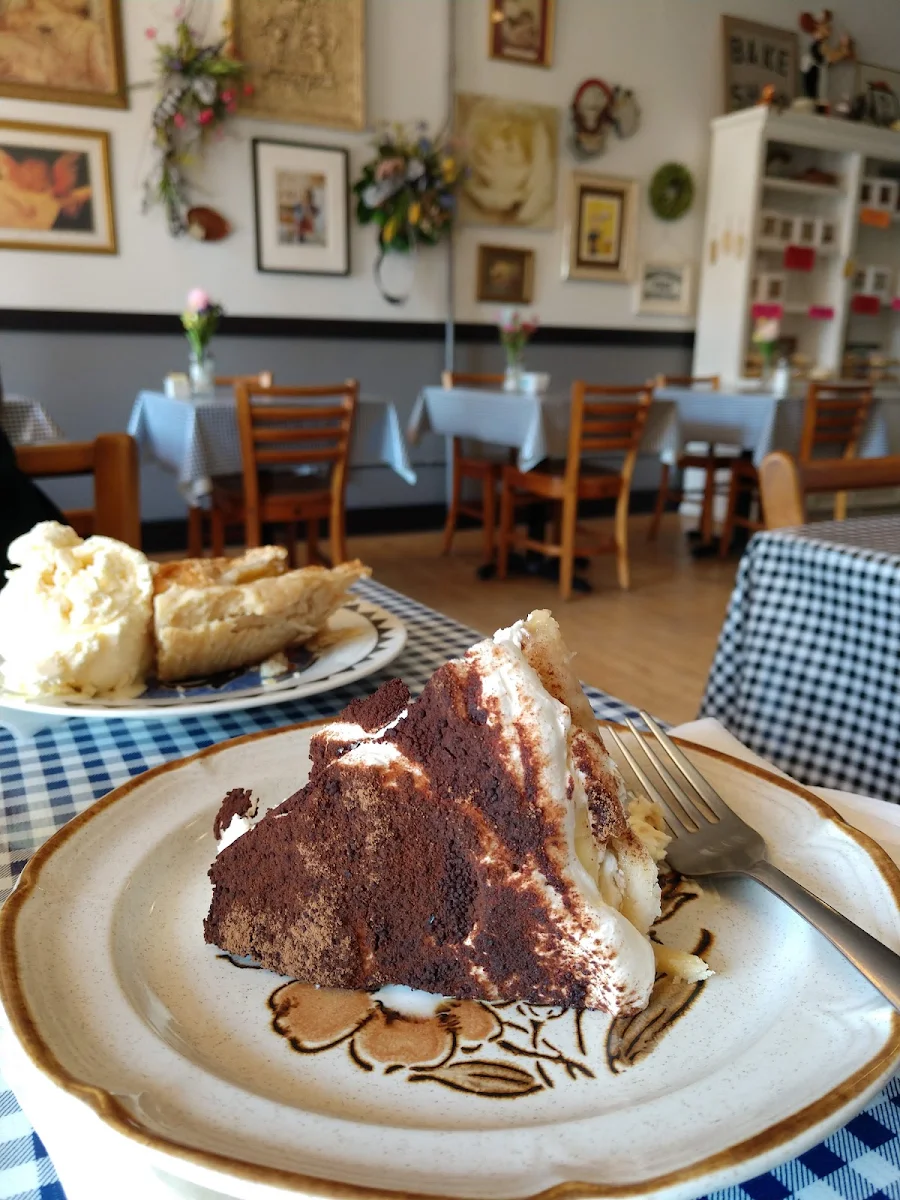 Foreground Tiramisu Pie Background Peach Cobbler Pie