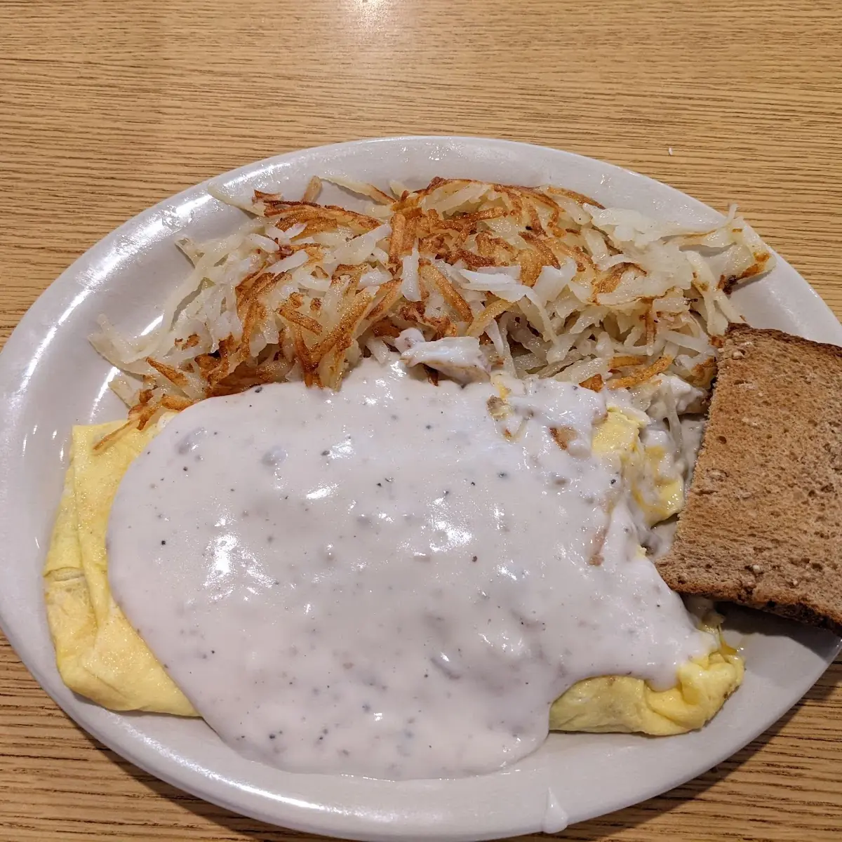 Veggie Omelette and Hash Browns with Sausage Gravy
