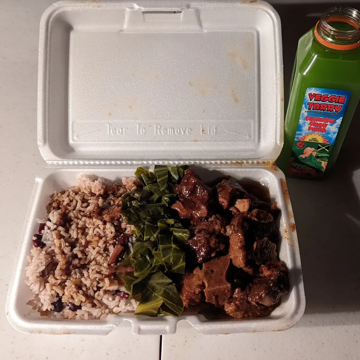 Oxtail Collards Rice & Beans
